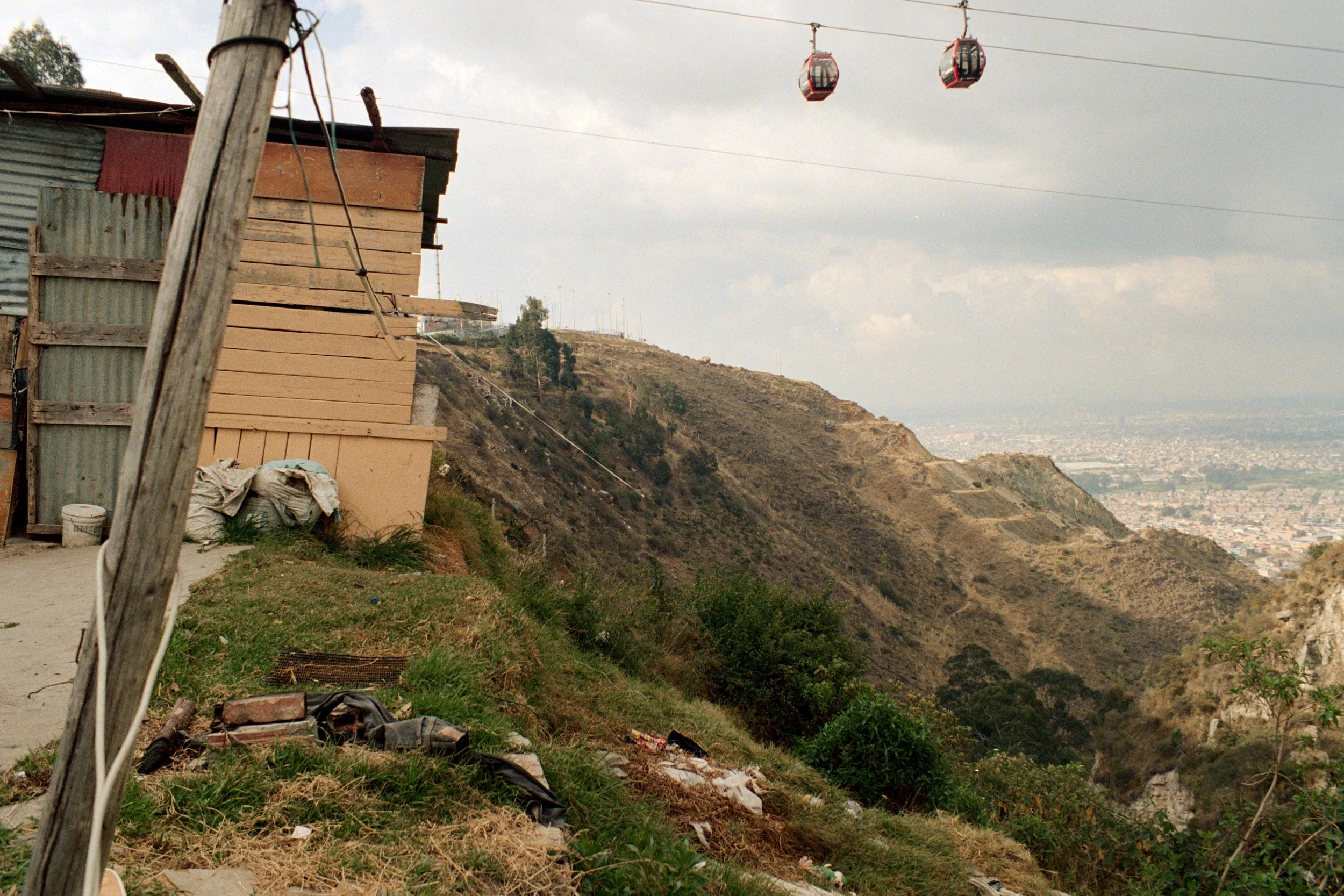 A house built at the edge of a cliff. Land erosion has made this house closer to edge over the past few years. 