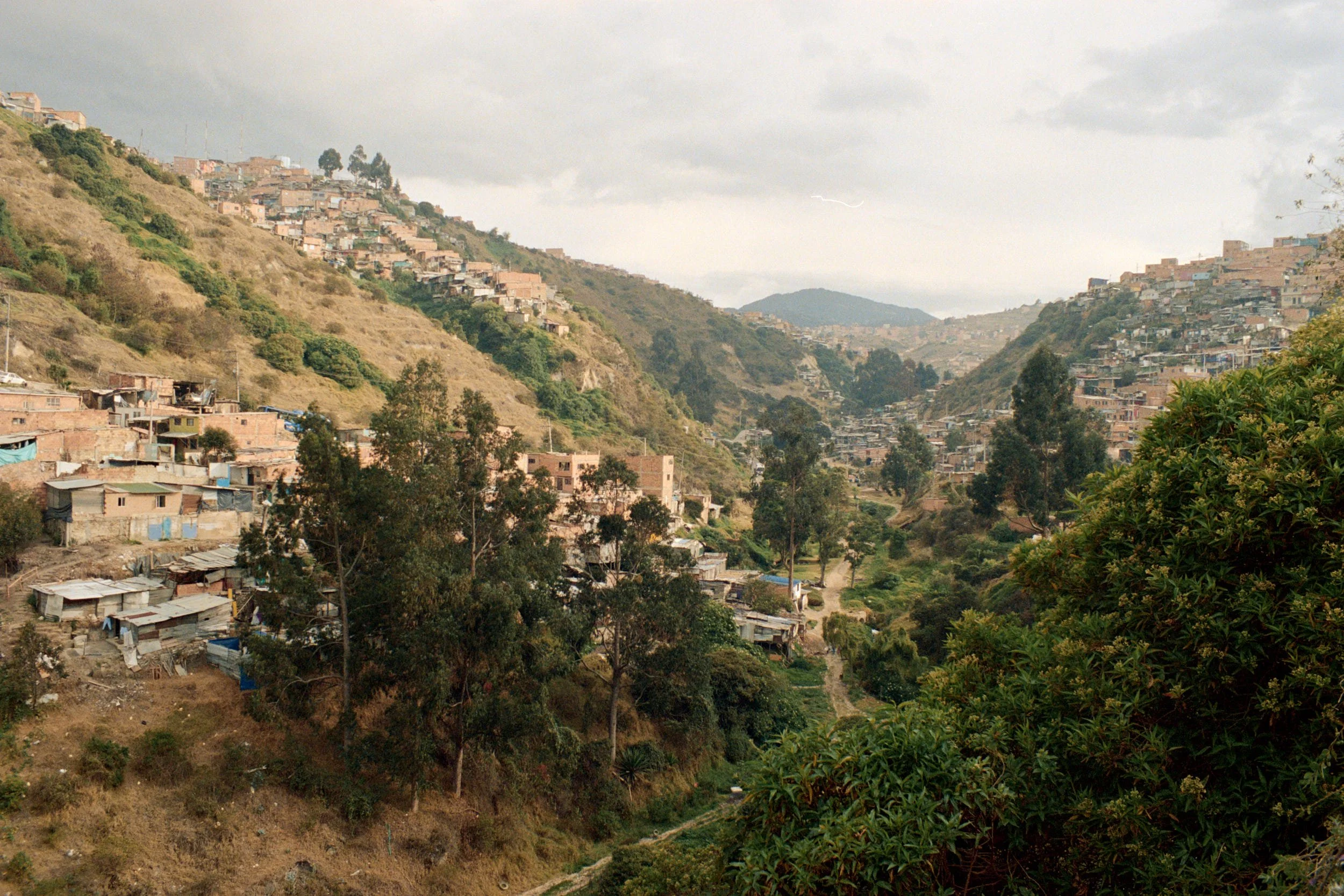 A glimpse through the steep valley that houses more informal settlements. 
