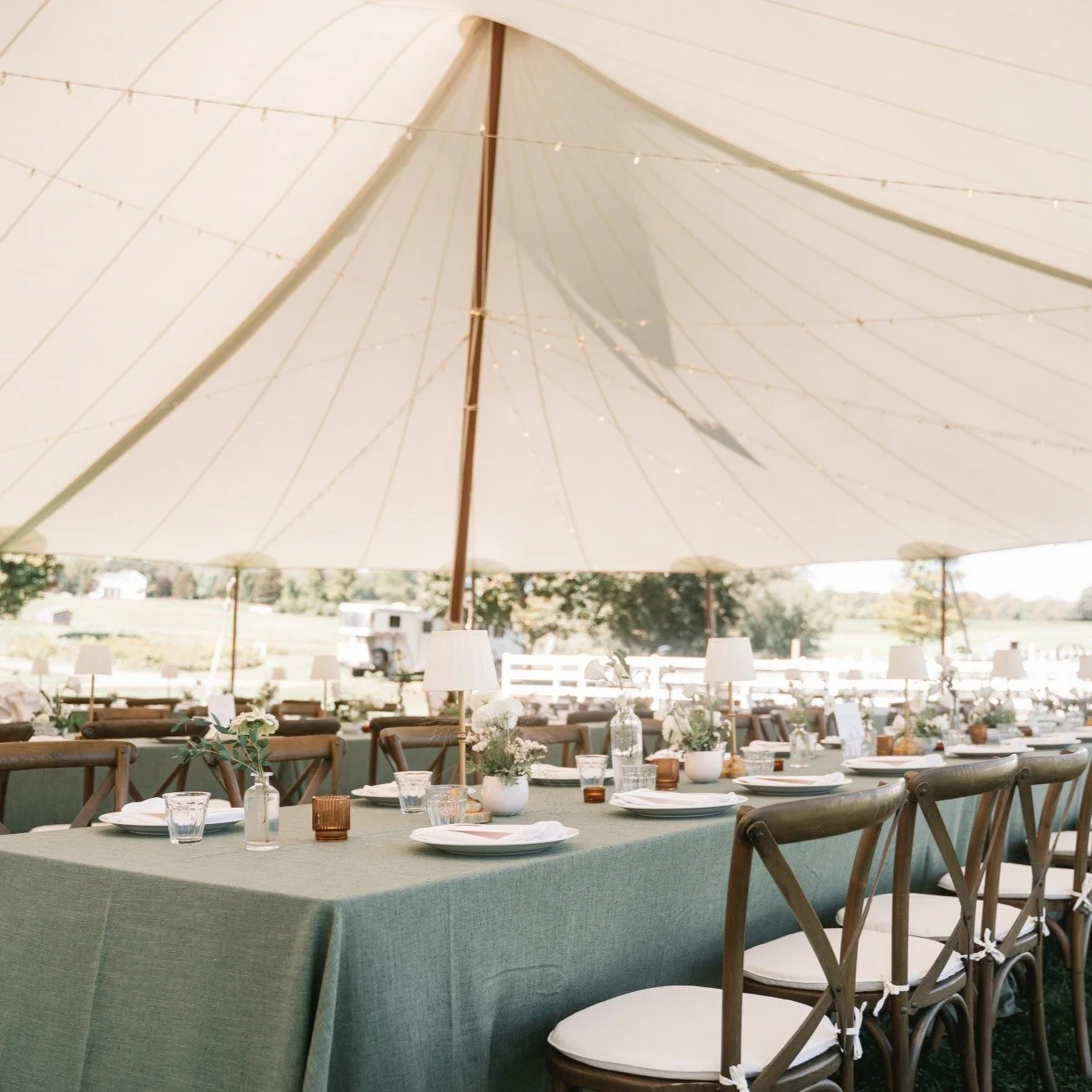 From day, to afternoon, to night - the table sets the stage for your wedding. And this one held it's own through it all. 

Soft lighting from pleated table lamps, tasteful and delicate florals, personalized menus, and quality linen. 

This table was 