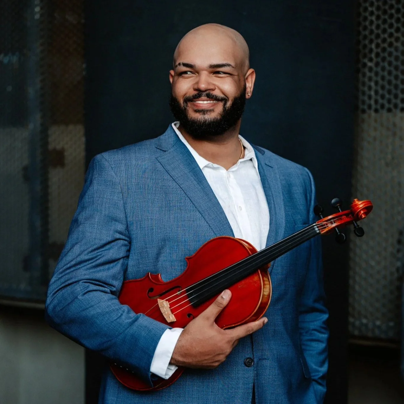 headshot of Devin Moore holding viola
