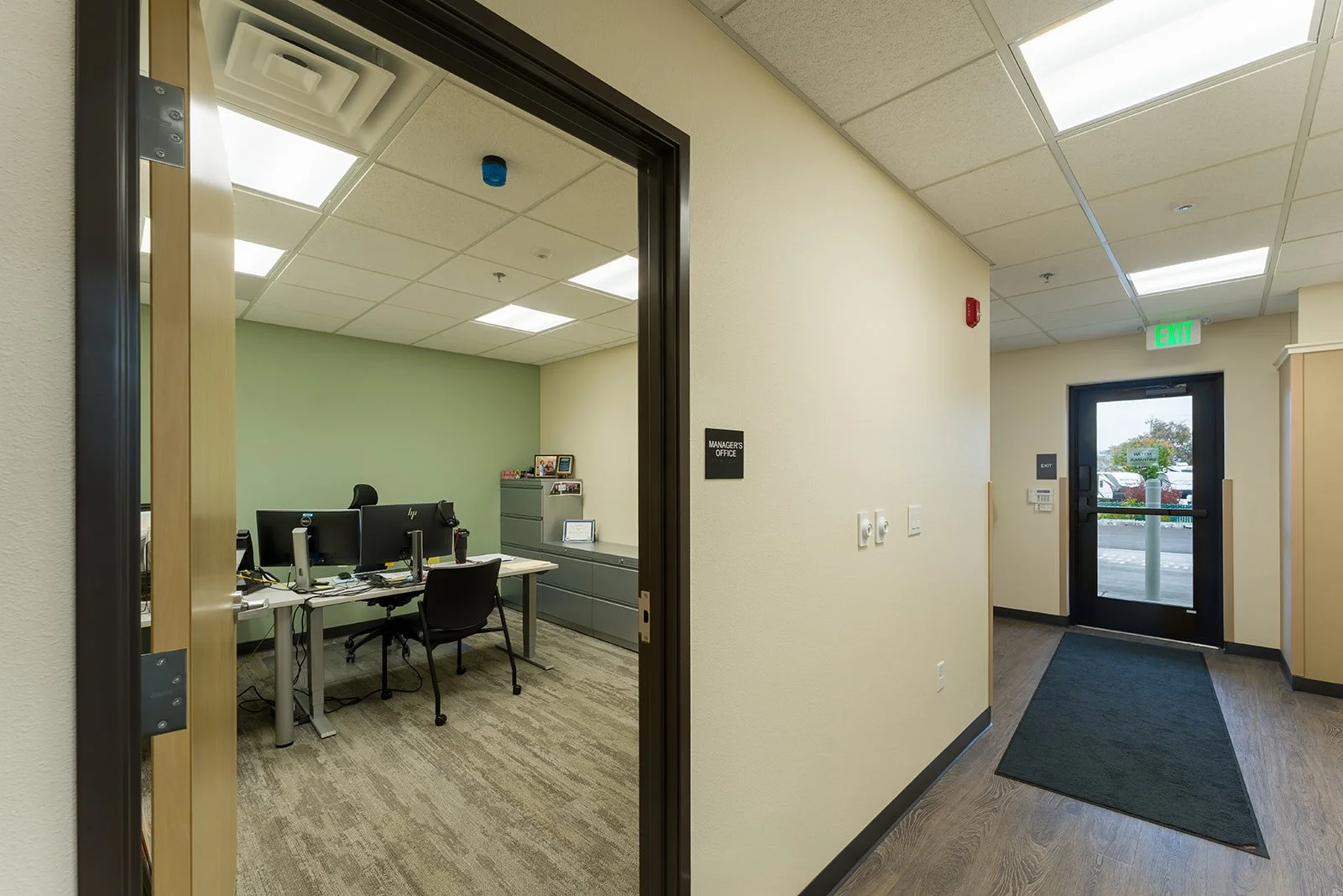 Office and back exit. 