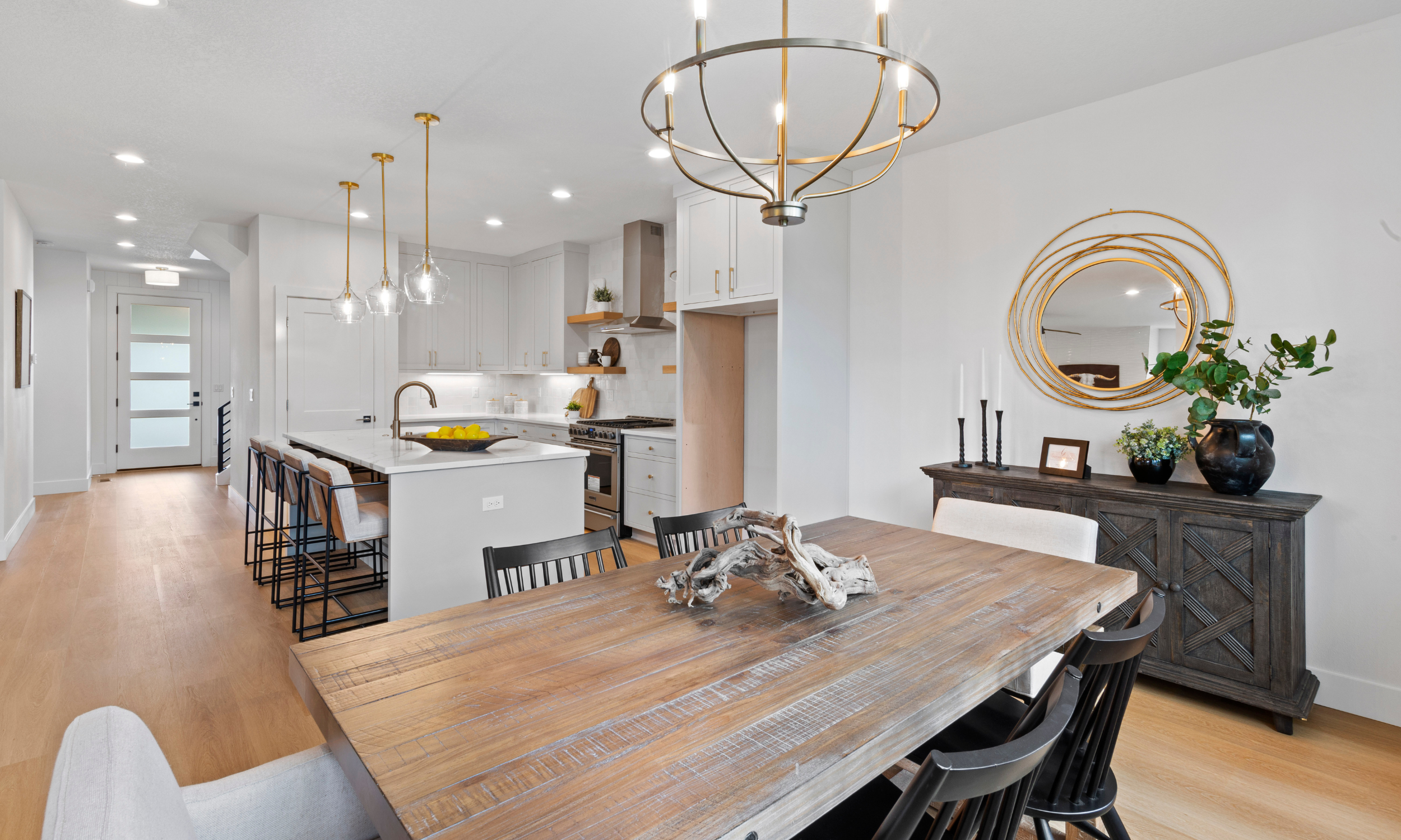 Staged kitchen being viewed from the dining room