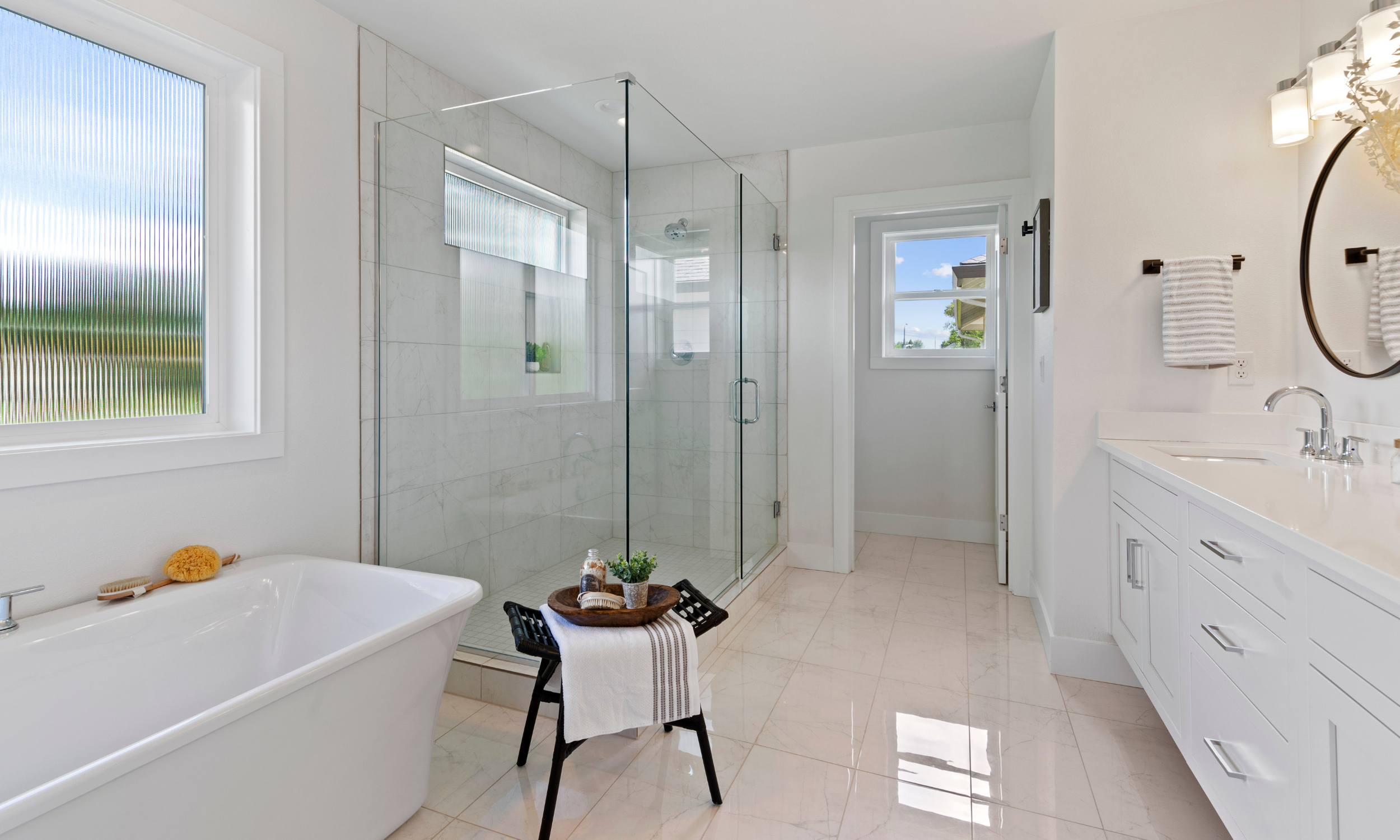 Staging in master bathroom to show soaker tub and walk in shower