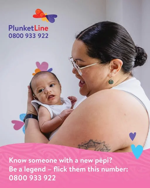 A woman with dark hair and glasses holding a baby with a white outfit. There are colorful heart and swirl designs, with a logo and contact number for PlunketLine.