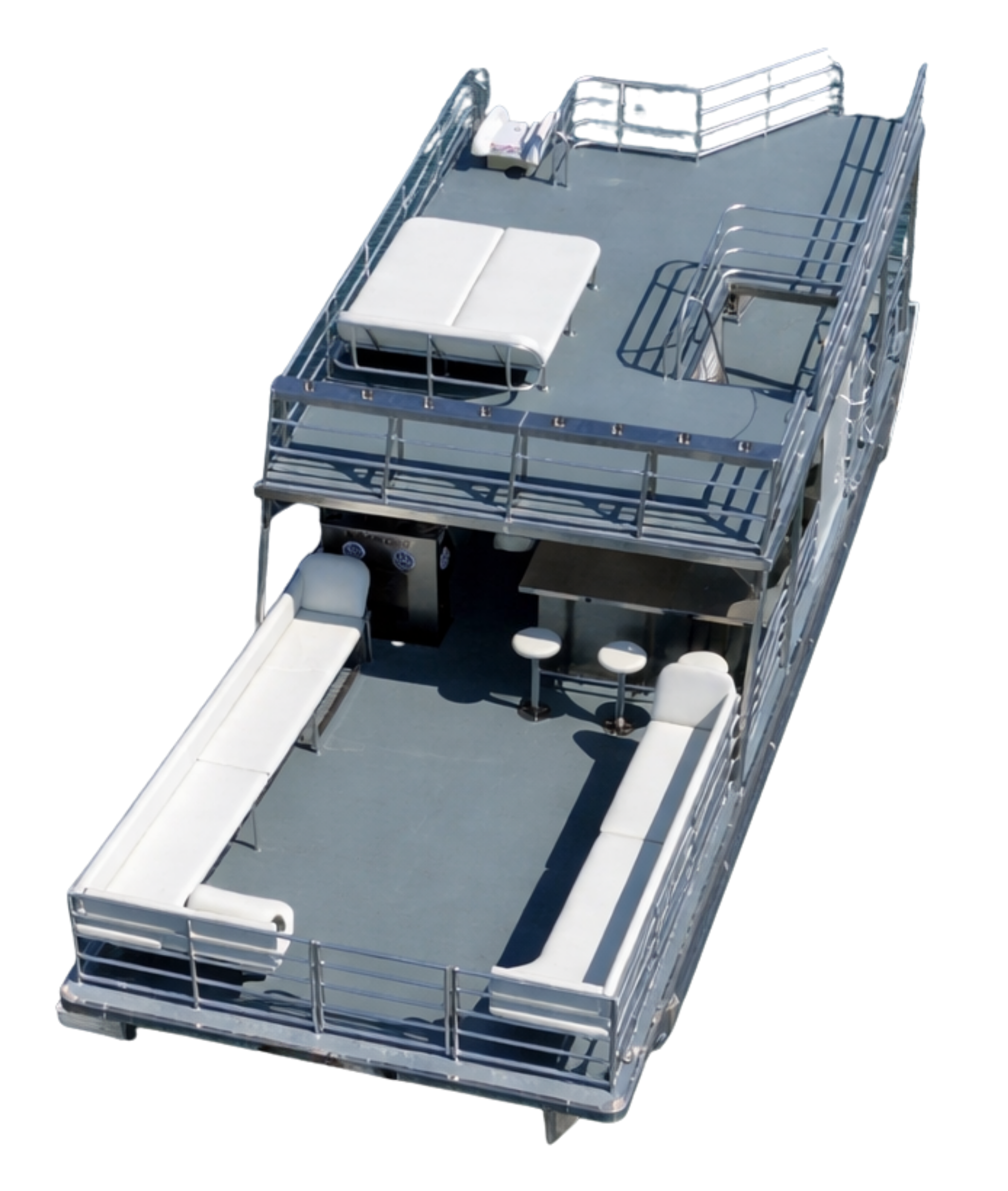 Aerial view of a large, empty ship deck with white seating, slides, and safety equipment.