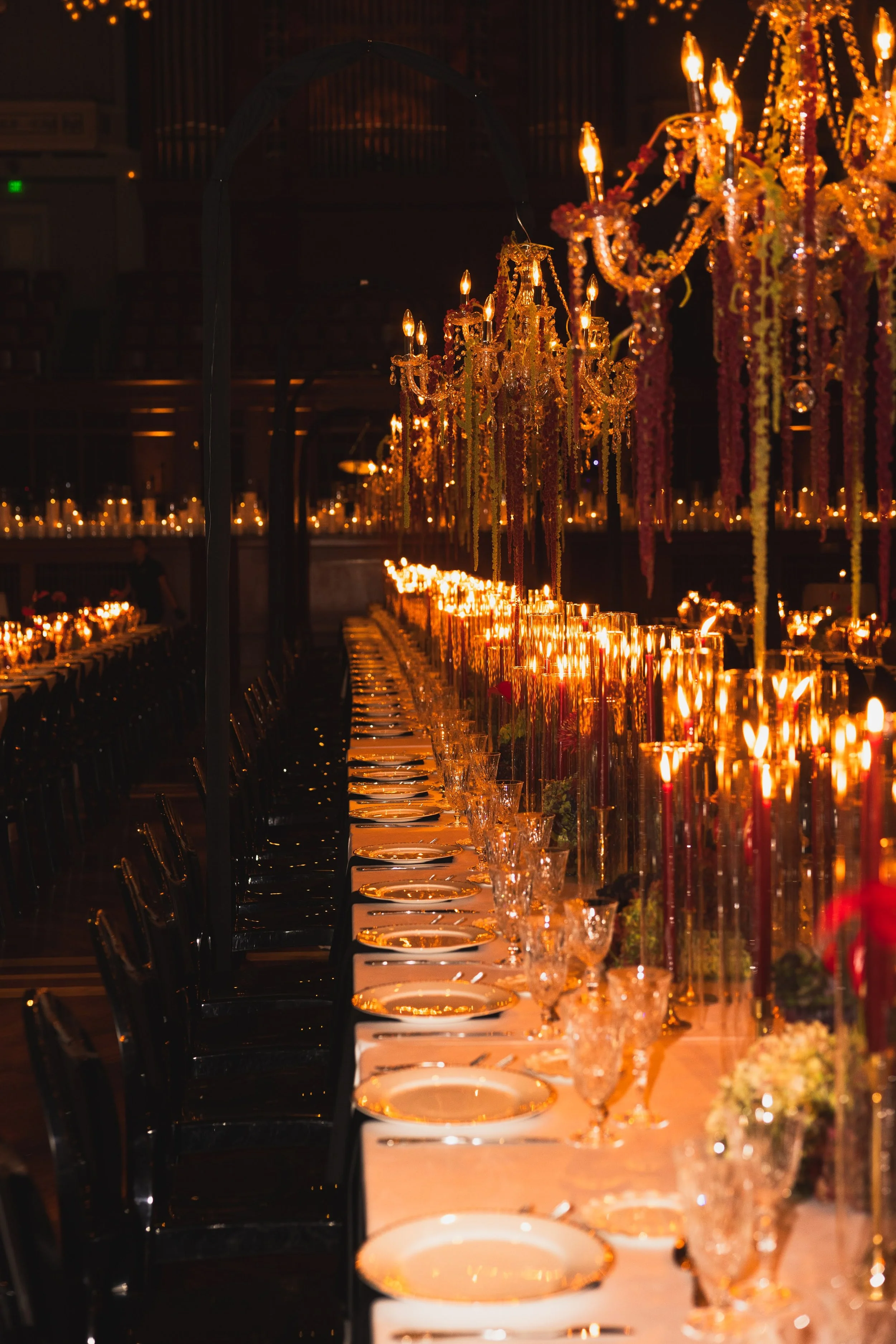 Low Hanging Chandeliers over Dinner Tables