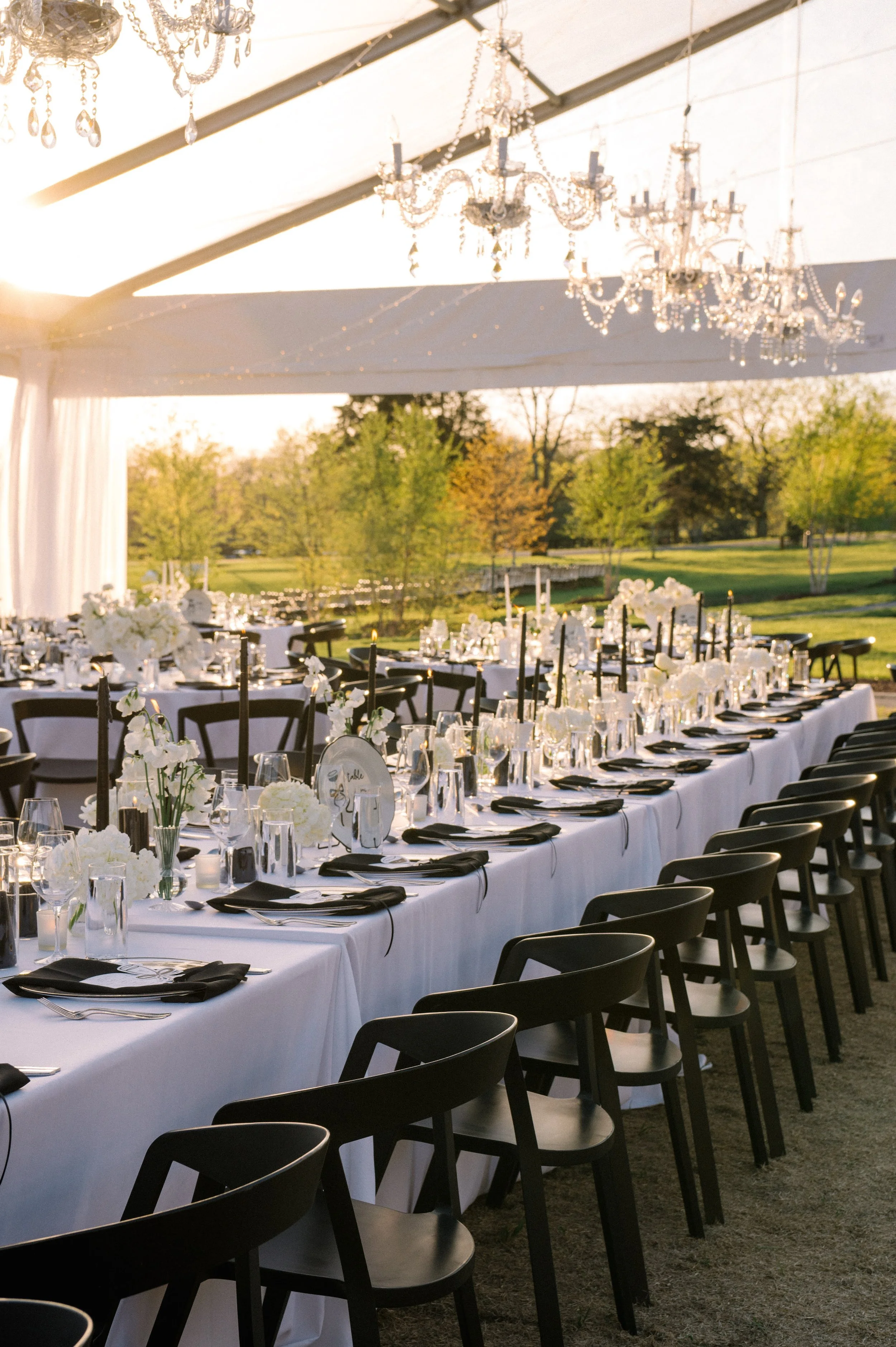 6-Arm Crystal Chandeliers and Pole Draping in the Event Center Tent