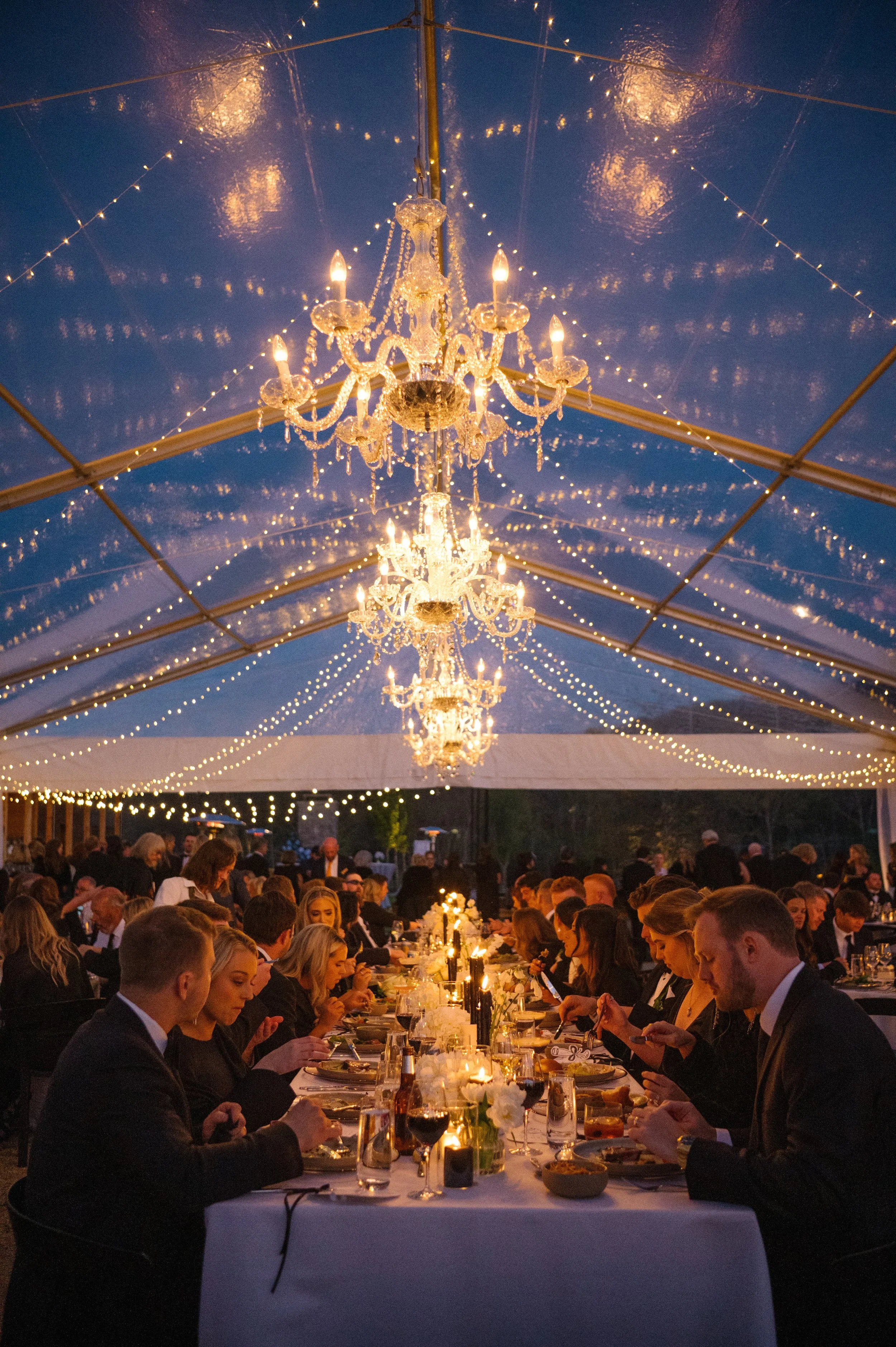 Twinkle Lights and 6-Arm Crystal Chandeliers in the Event Center Tent