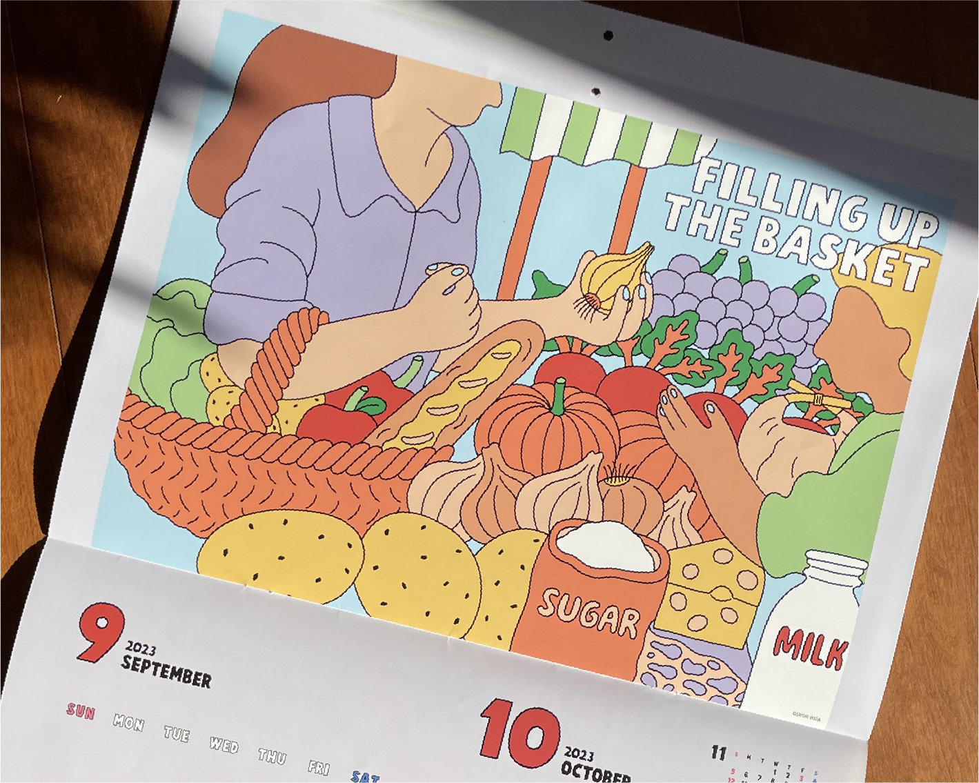 Detail of 2023 calendar illustrations for HOKUREN agricultural cooperative created by freelance illustrator Sayori Wada