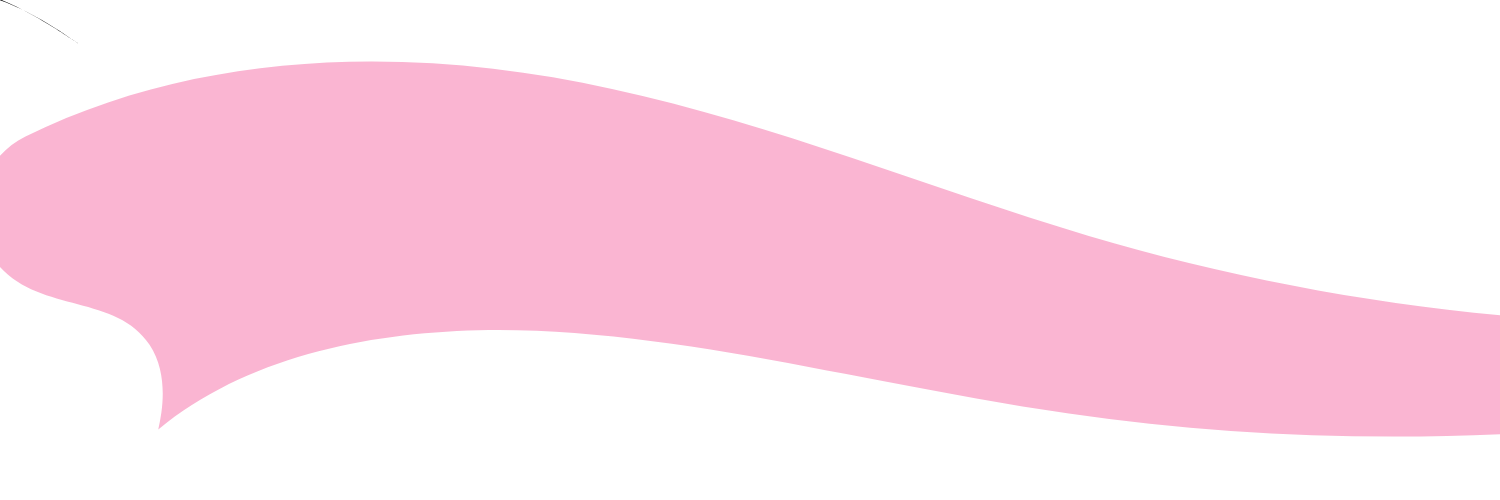 A pink plastic spatula with a wide, flat blade and a rounded handle.