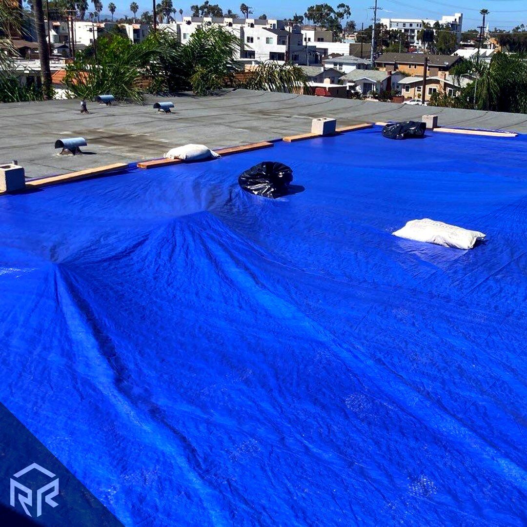 If you get an emergency roof service, such as a tarp or emergency sealant, it's always important to follow up with an actual roof repair once the rain is over. Tarps and emergency sealants typically only last for a few weeks and can leave your roof v