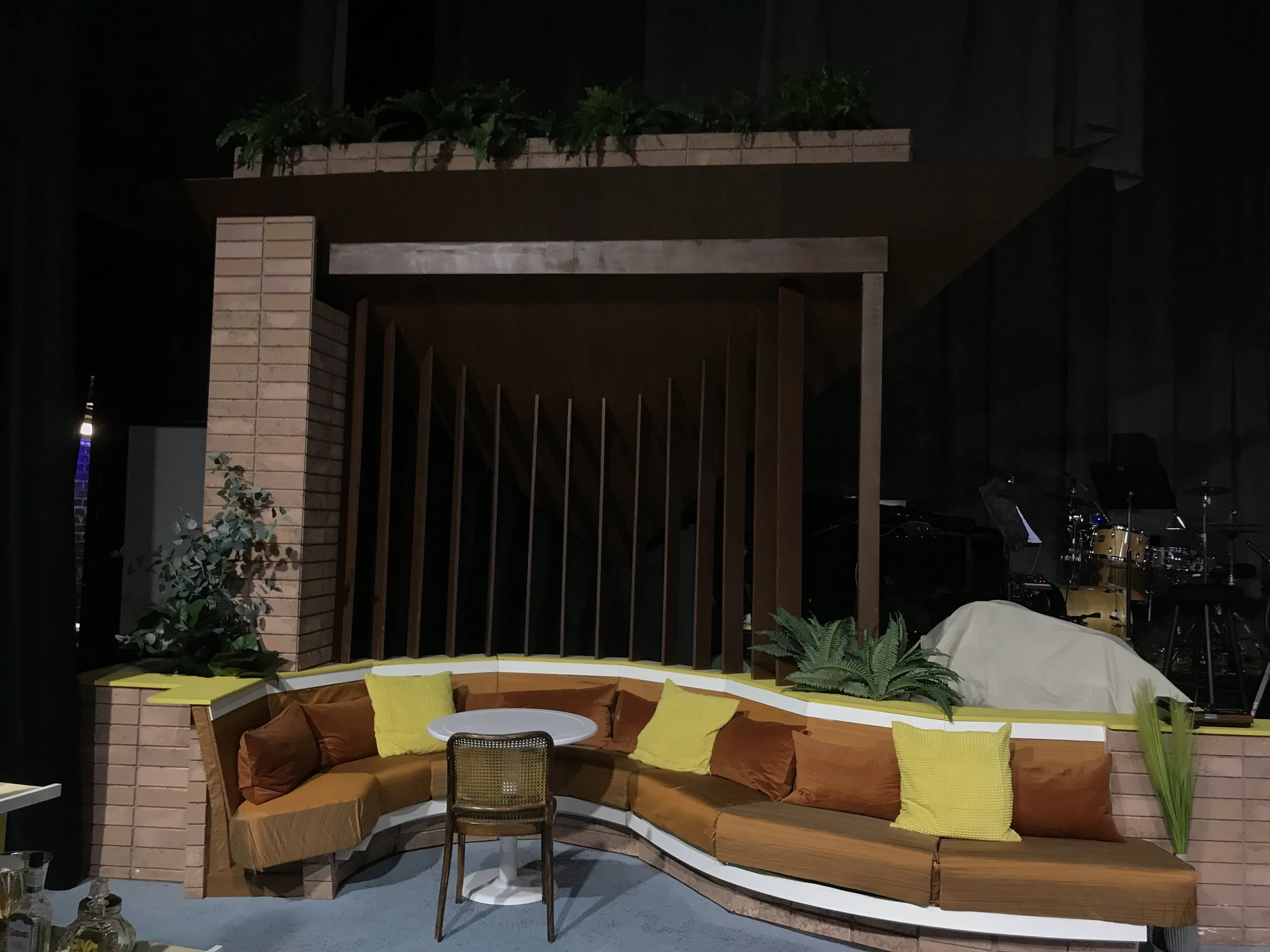 "Company" brick and wood paneling

Scenic Design: Brian Clinnin