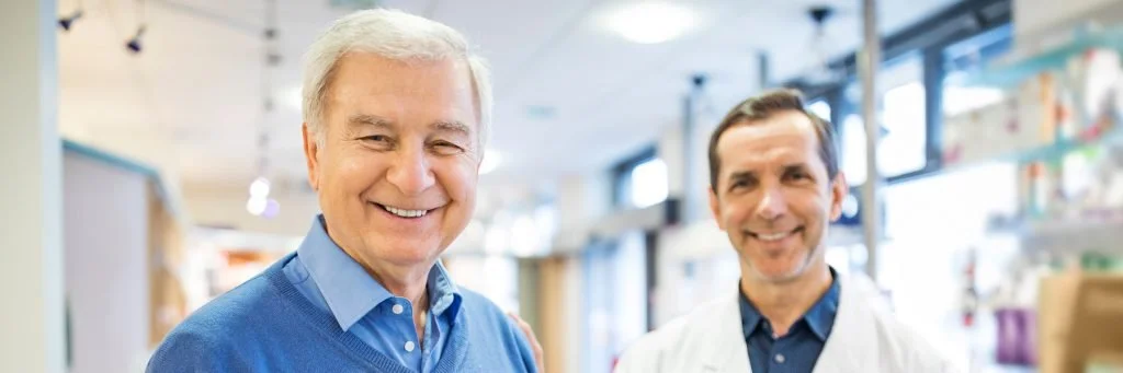 Older man with doctor