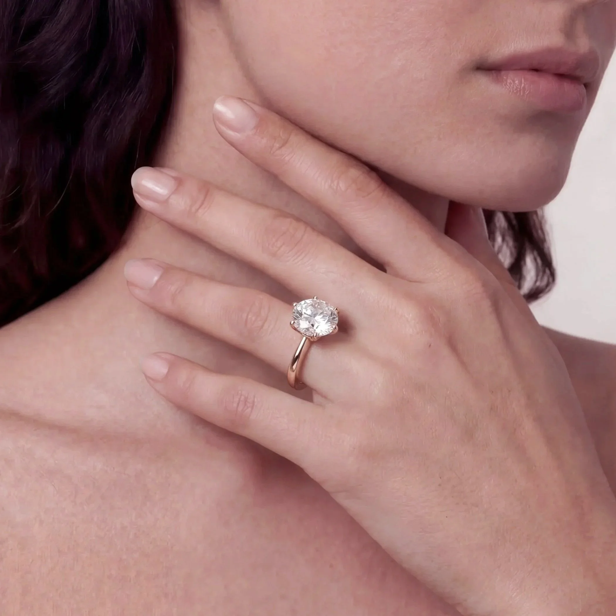 round-solitaire-ring-on-body-rose