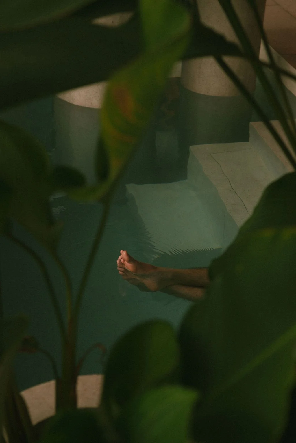 Bare feet by the pool — the sweetness of doing nothing