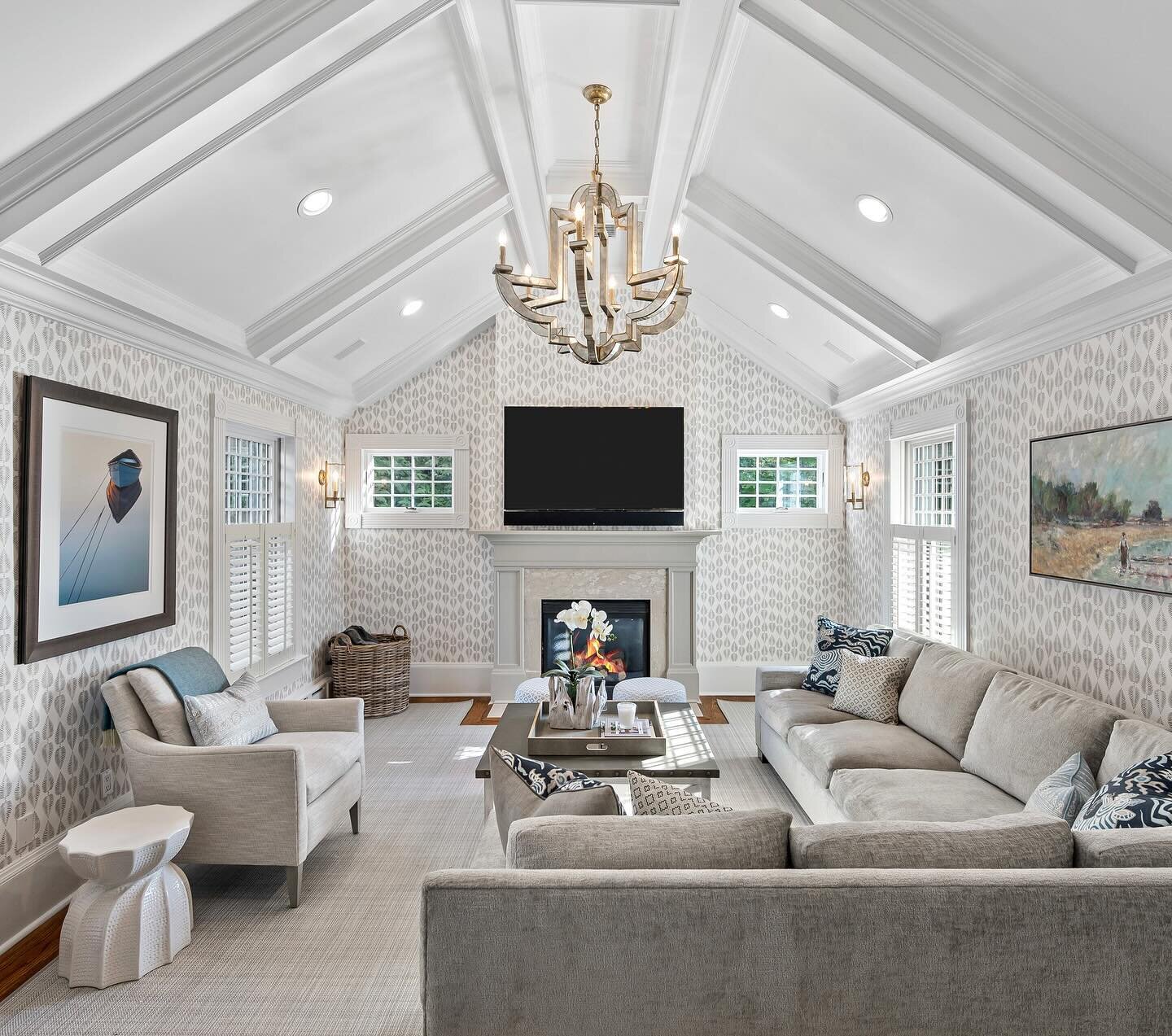 SPRING INTO STYLE with a makeover like this Larchmont Family Room! Lighter, brighter, comfier, and more organized. @sarinagaluinteriors #familyroom #interiordesign #afterandbefore