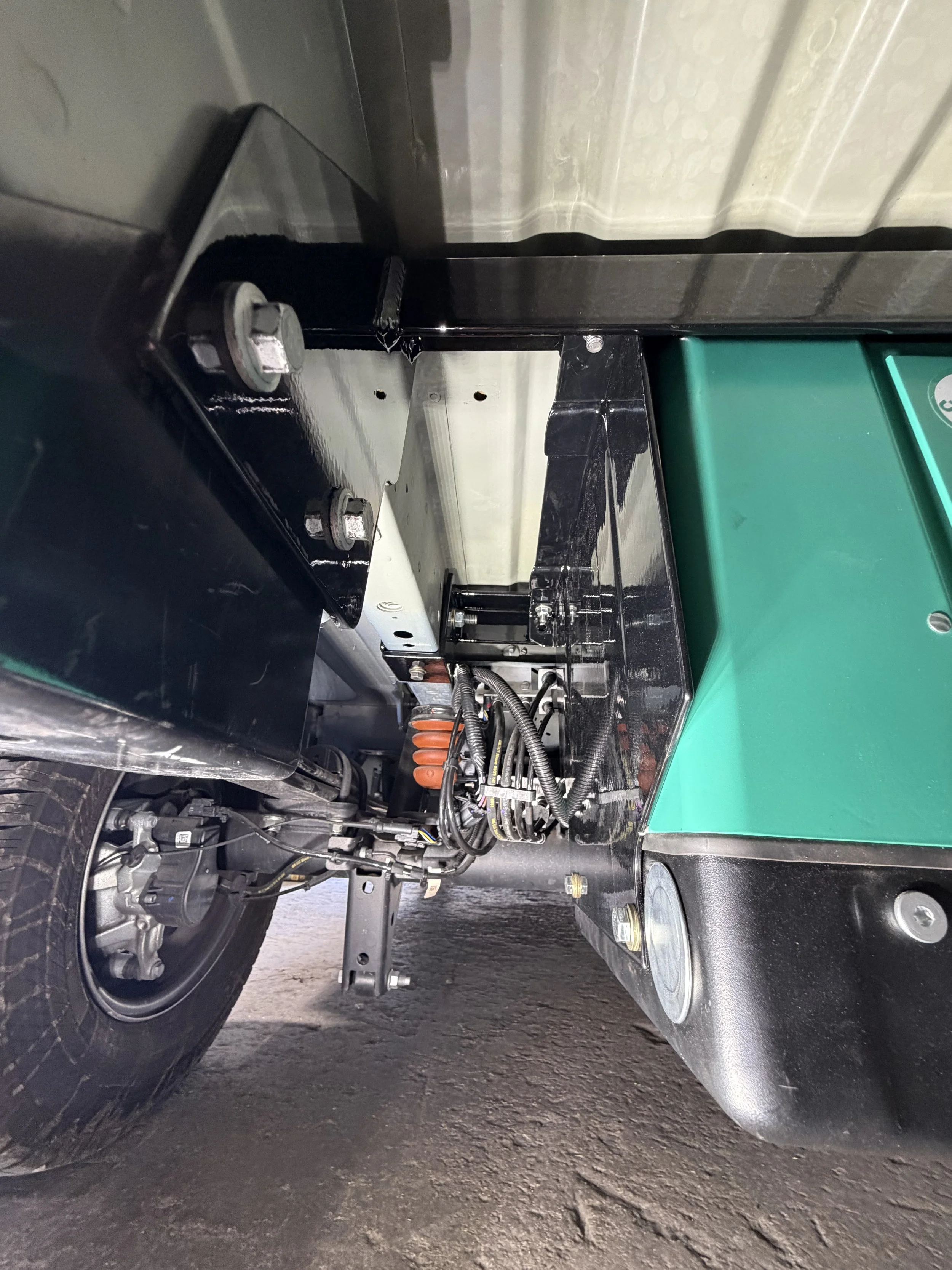 Ford Transit Generator mounted and plumbed in to power adventure van. 