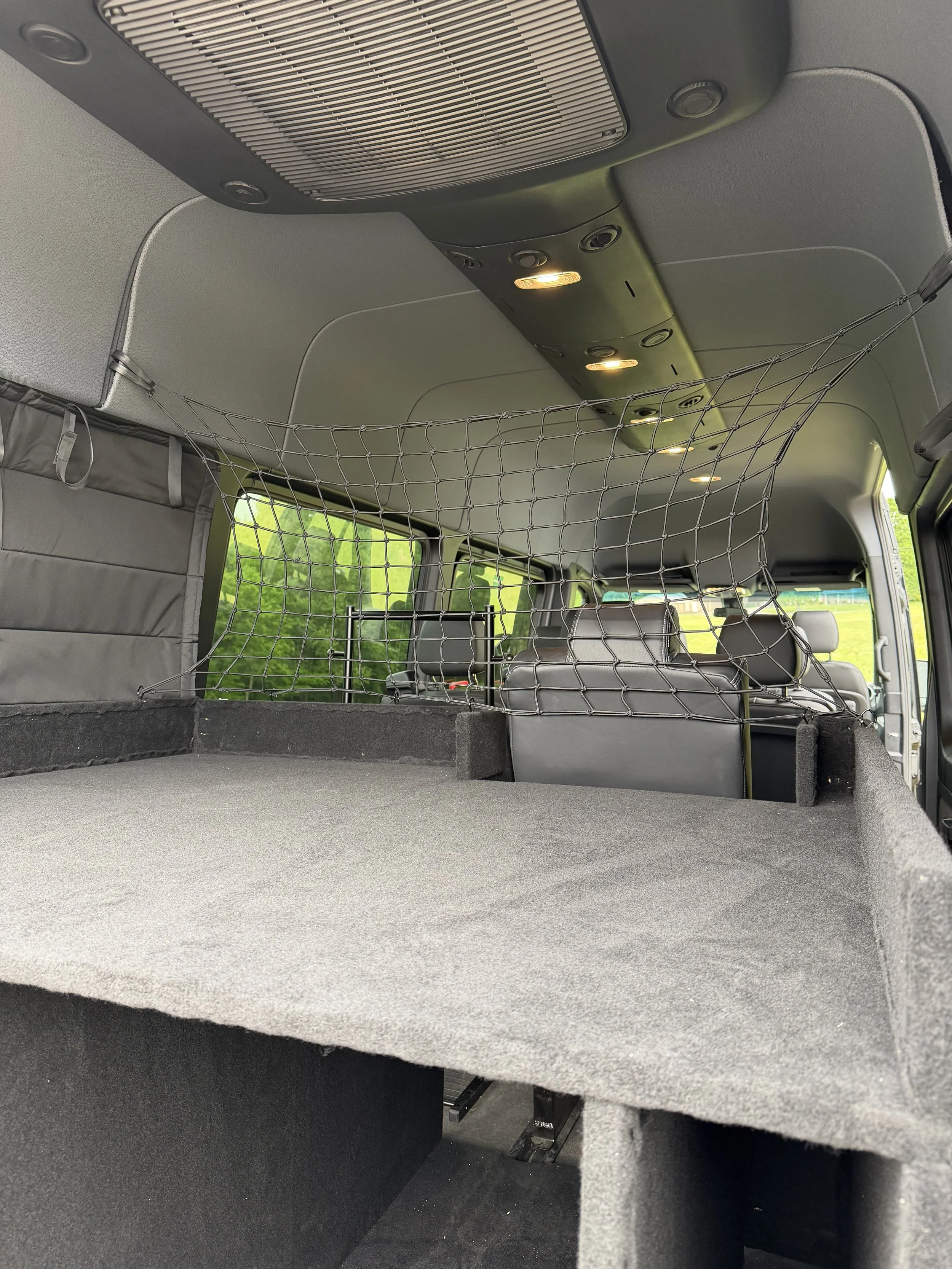 Custom storage, cargo netting, no holes drilled