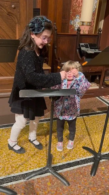Margaret helps Anna set up for Compline