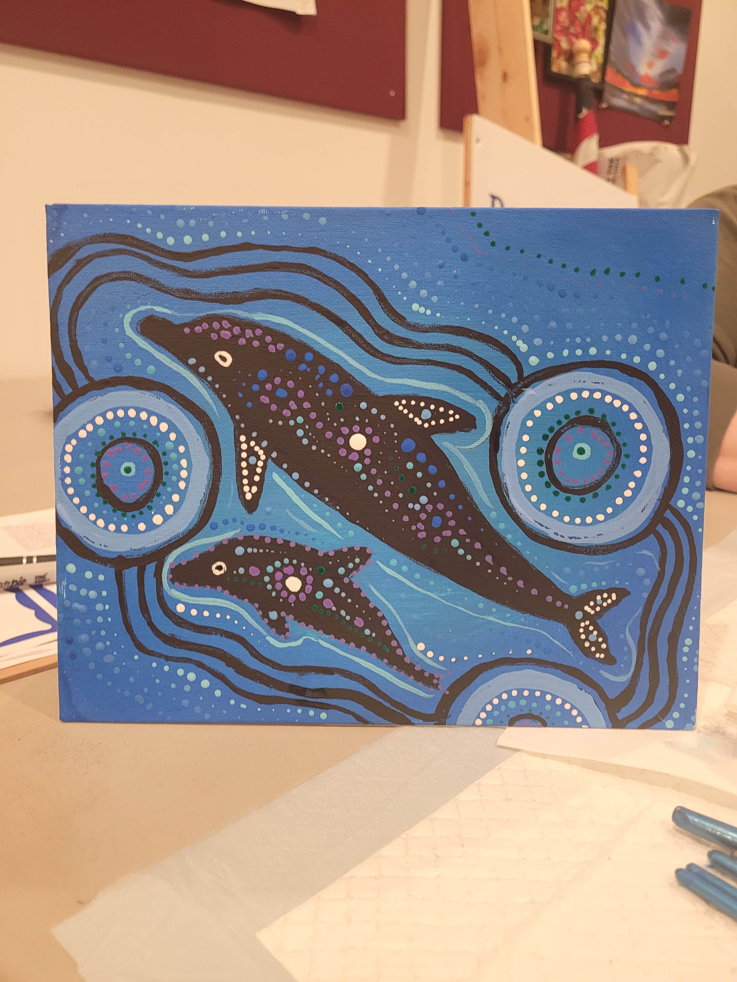 Aboriginal-style dolphin dreamtime painting
