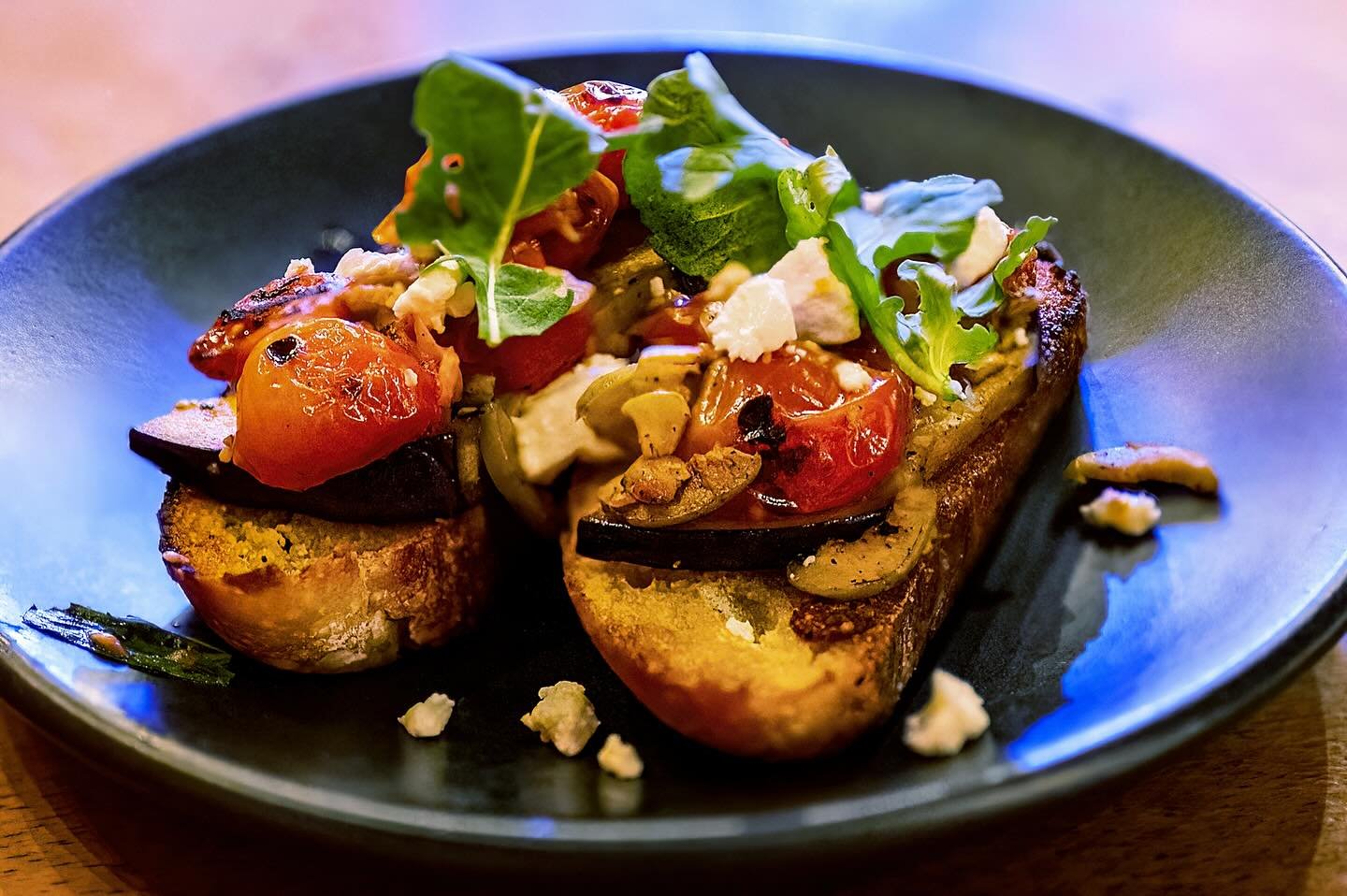 Take a bite into some delicious bruschettas with the perfect balance of flavors.