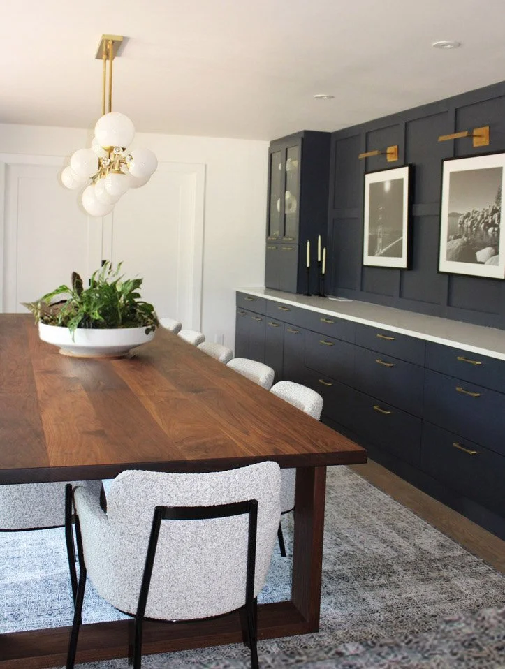 Entrance view of our Modern Dining Room remodel. The custom build in wall to wall cabinetry has a wide countertop area with hidden plugs which allows for heated serving platers and plenty of space for all the homemade dishes. Perfect for large holida