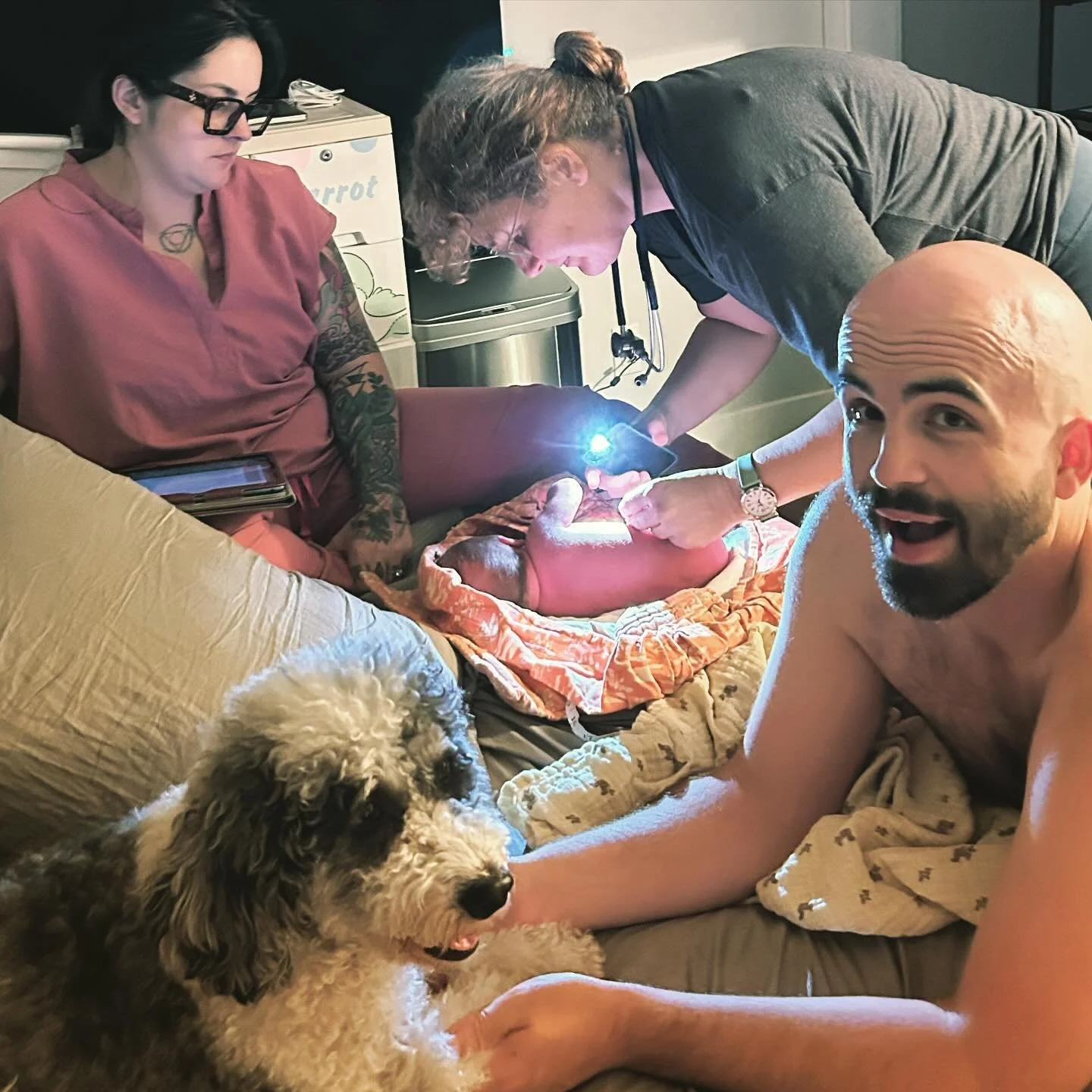 A little glimpse at newborn care at a homebirth and 1st postpartum (shared with permission).

1) newborn exam in progress with dad and big furry brother supervising :) Midwives check reflexes, weigh, measure and check baby head to toe. 

2) newborn s