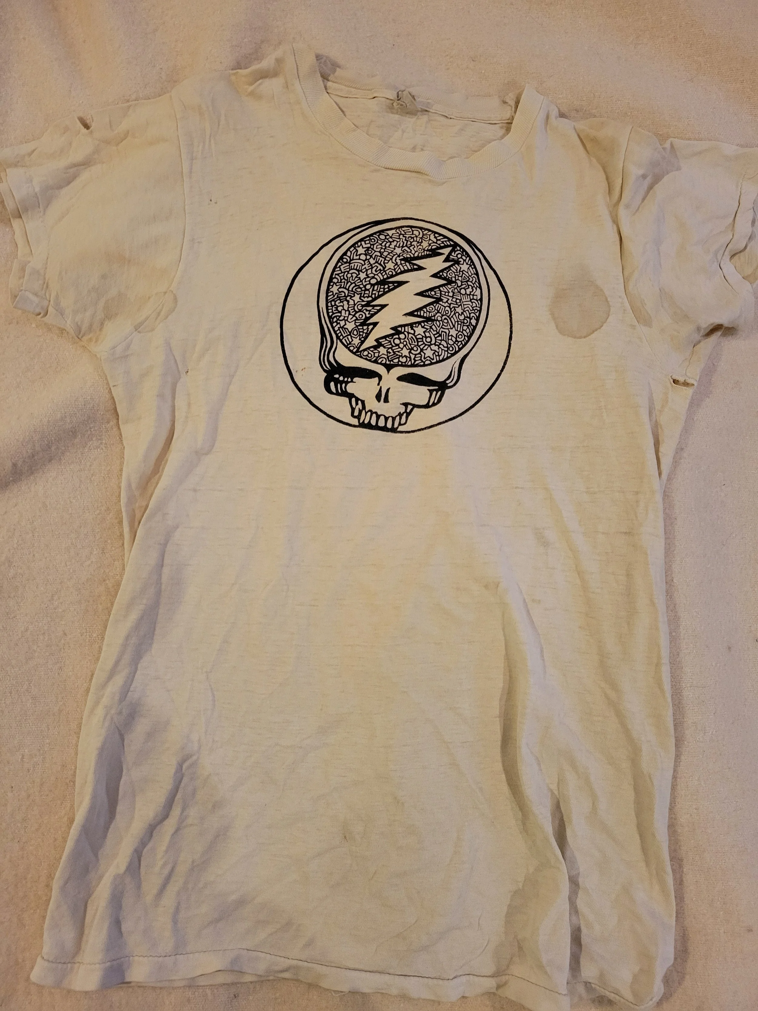 T-shirt by Keith Haring, c. 1977. Courtesy of Brett Krasnov. 

Brett Krasnov: "Though not wearable anymore, this will always be my favorite vintage dead shirt. Made by Keith Haring when he was still a HS student in Kutztown. I helped him screen some 