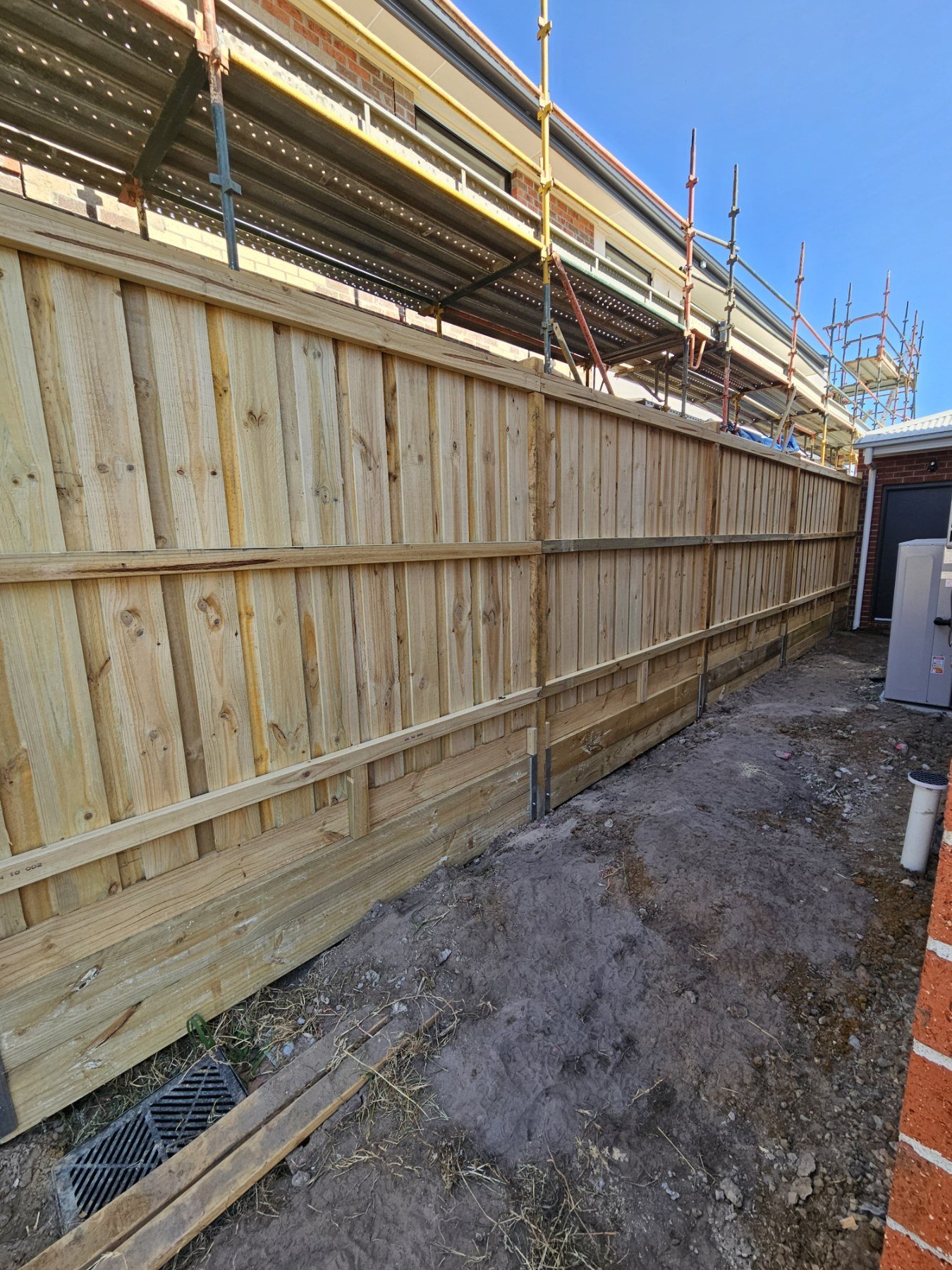 Retaining wall and fencing