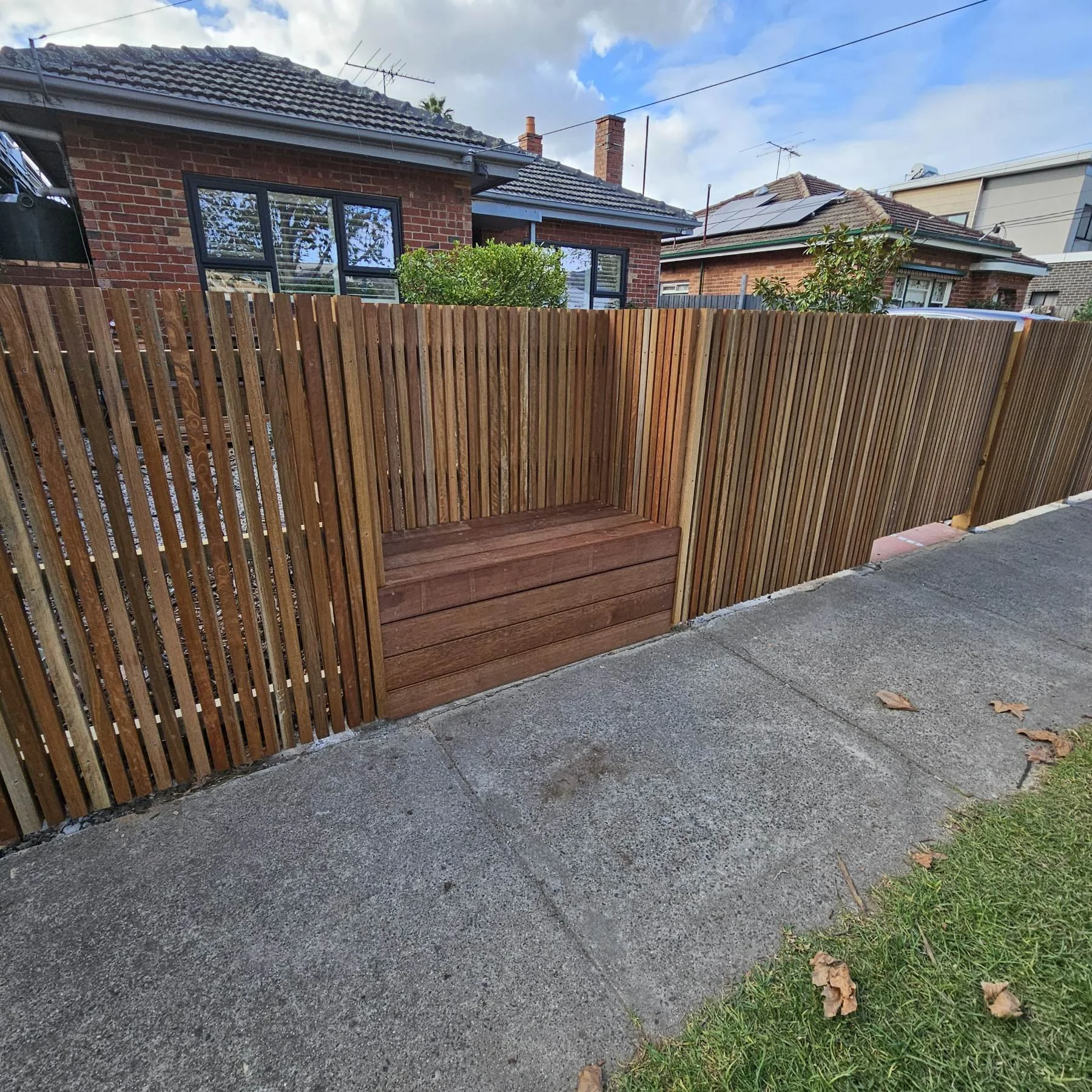 Batten fencing, seat, pedestrian gate and sliding gate.