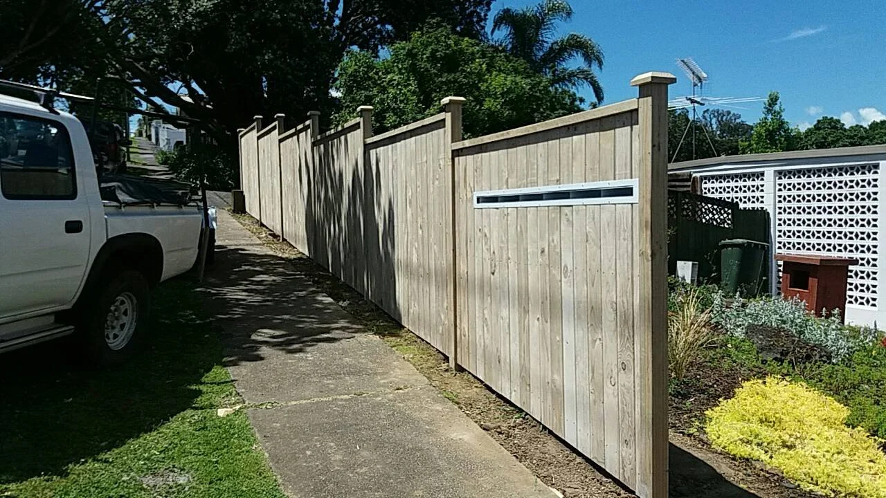 Shiplap timber fencing with a window.jpg