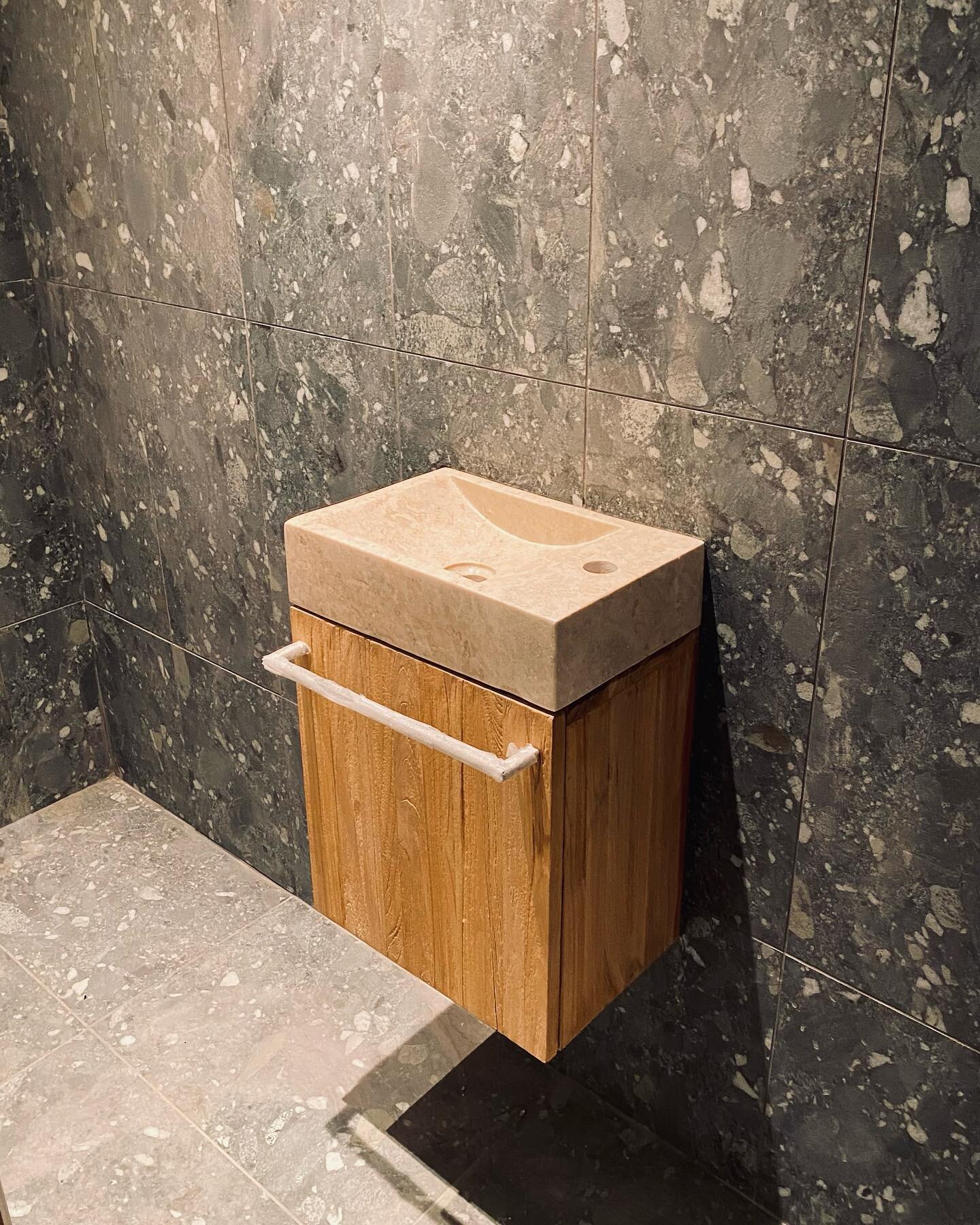 Work-in-progress cloakroom at our 18RG site. Obviously tap, mirror, WC, etc are all still missing, but we like the moody atmosphere in this smallest room of the house. 

architecture/ design: KOH Architects 
Tiles: @mandarinstoneofficial 
Vanity / ba