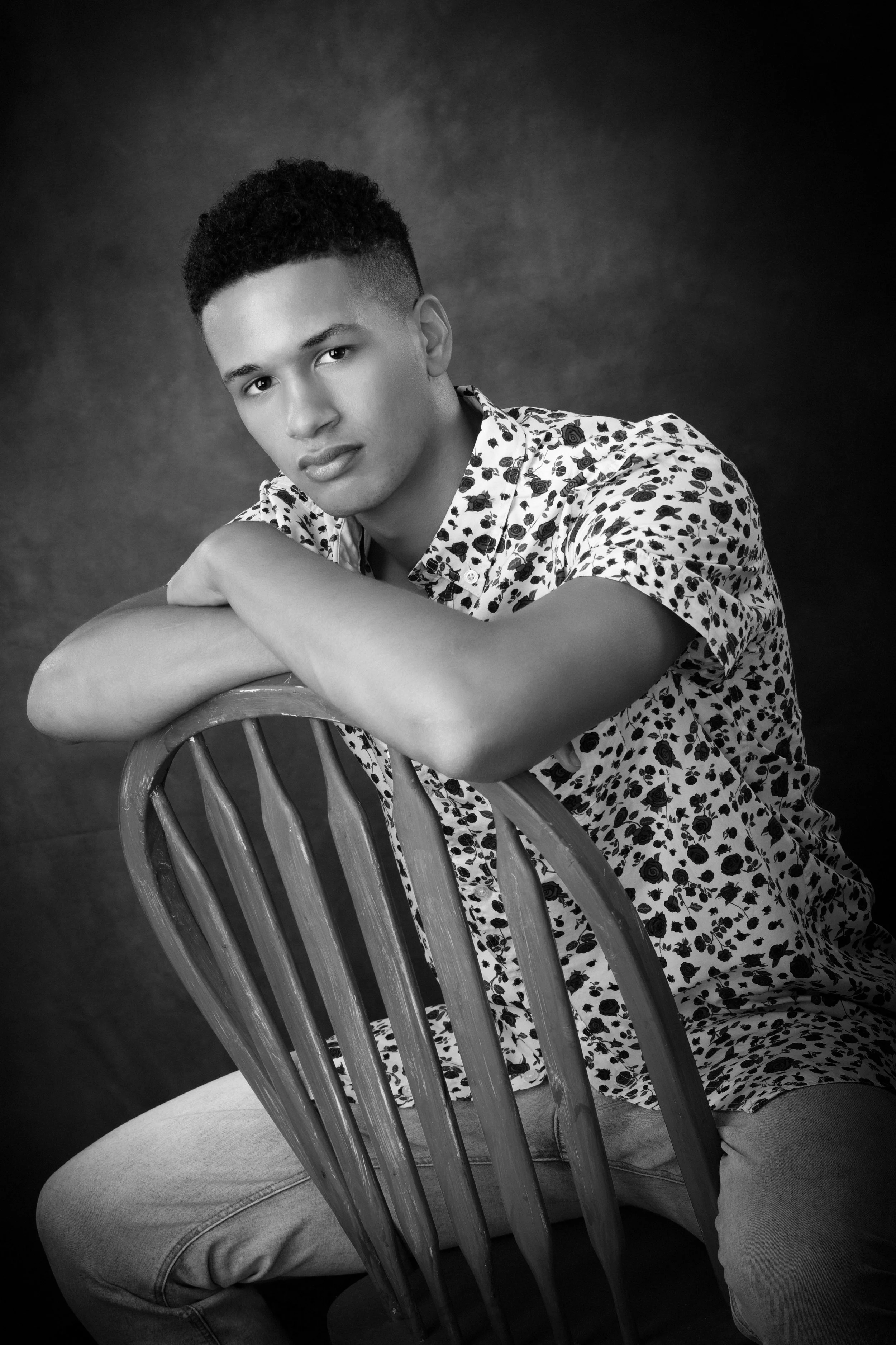 WV Senior Boy leaning on chair back.JPG