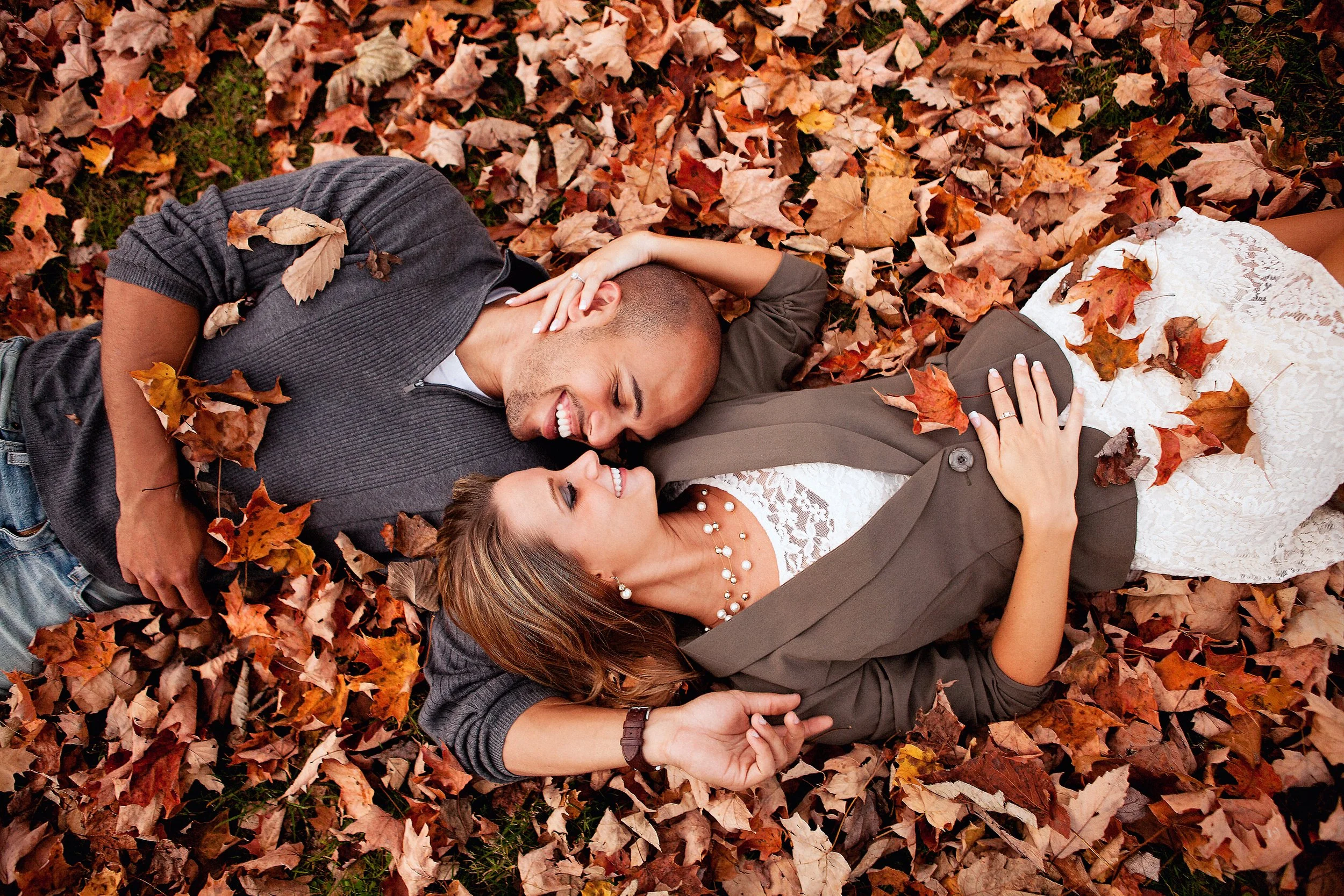 Engagement Couple in the leaves.jpg