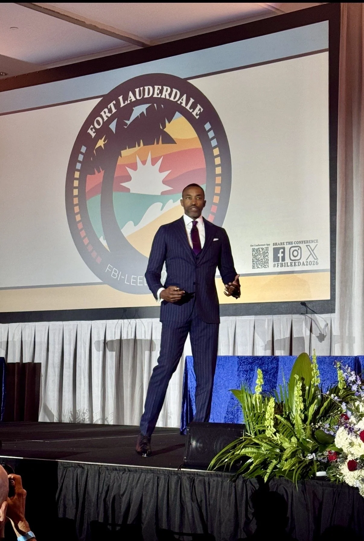 Spencer Fomby speaking at the 2026 FBI LEEDA Conference