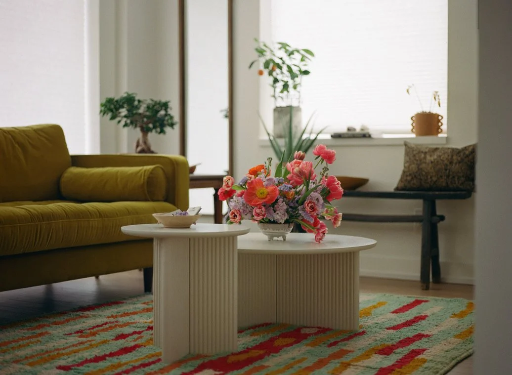 A Guelph therapist's yellow couch and marble table for couples counselling in Ontario