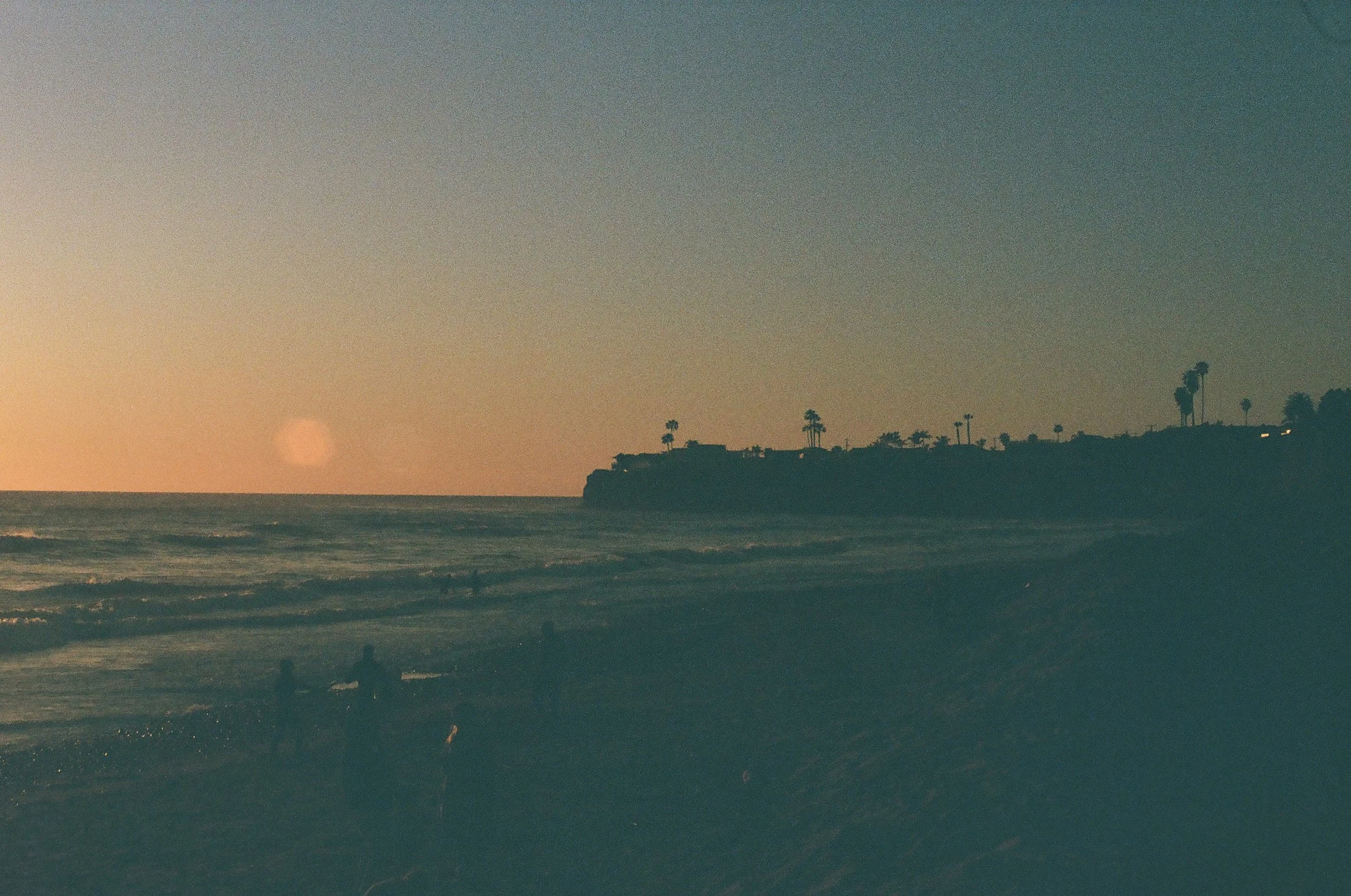 A sunset over water representing the calm therapy for students in Guelph Ontario can bring