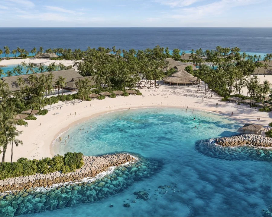 Aerial rendering of MSC Sandy Cay showing five sheltered coves, low thatched buildings and a solar array on the service side of the island
