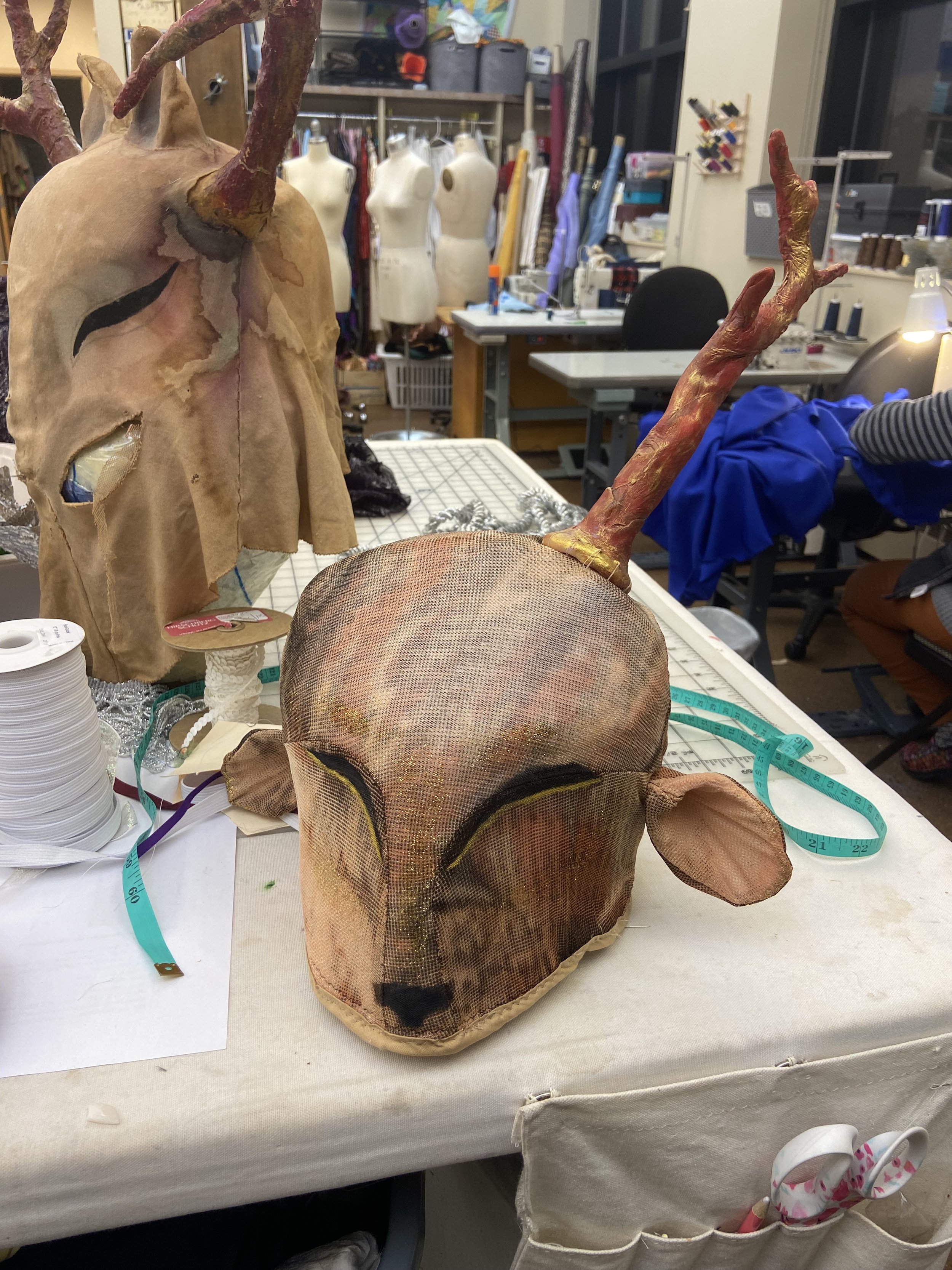 In progress deer head next to original deer head