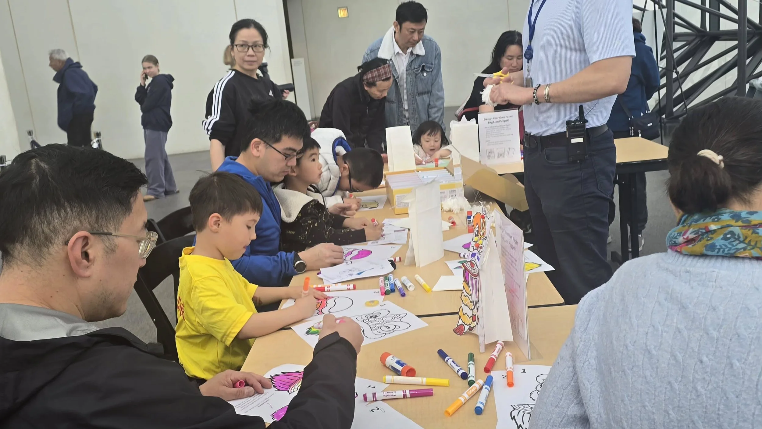 Part of the AANHPI Month Celebration at the JFK Library was a Crafting Workshop all about lion dancing! People of all ages enjoyed crafts ranging from making pom poms for a lion head, creating their very own cardboard box lion, to even having the opp