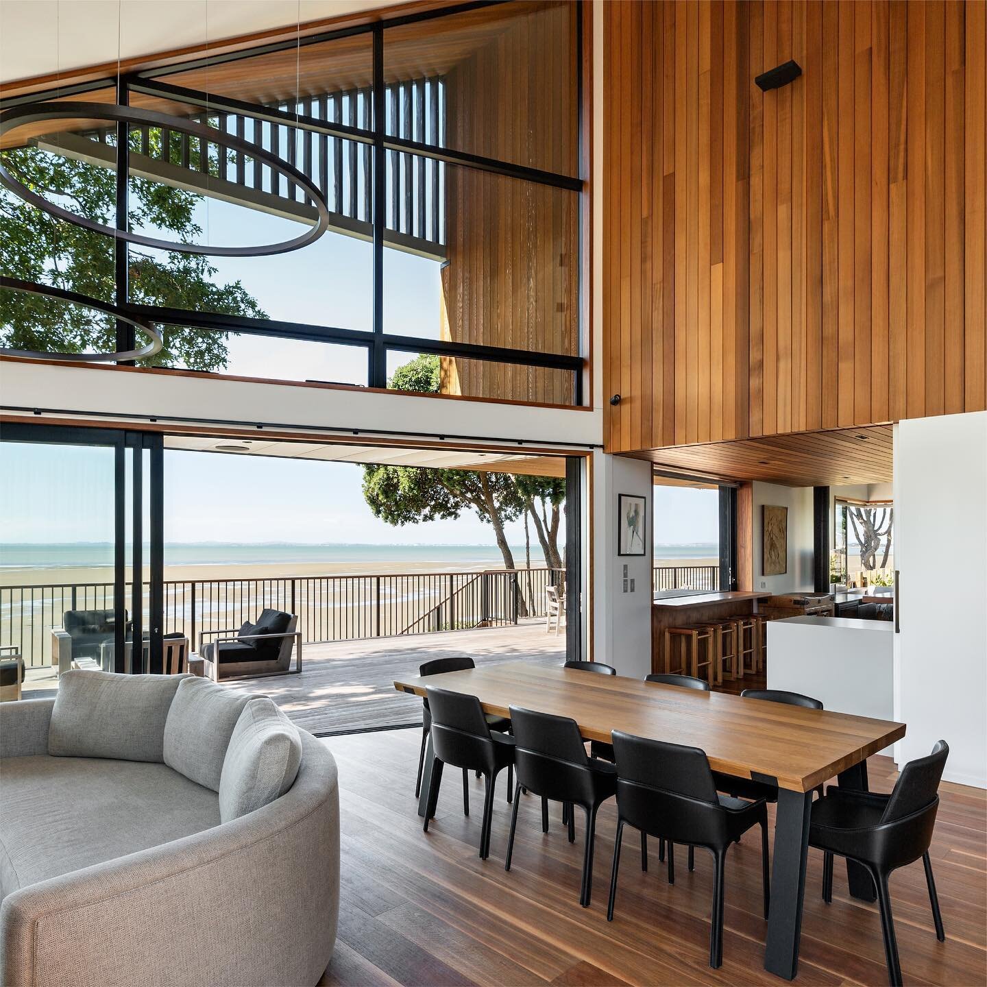 Seaside Barn &mdash; Soaking in all the views through the floor to ceiling aluminium joinery and showcasing some beautiful internal cedar work.