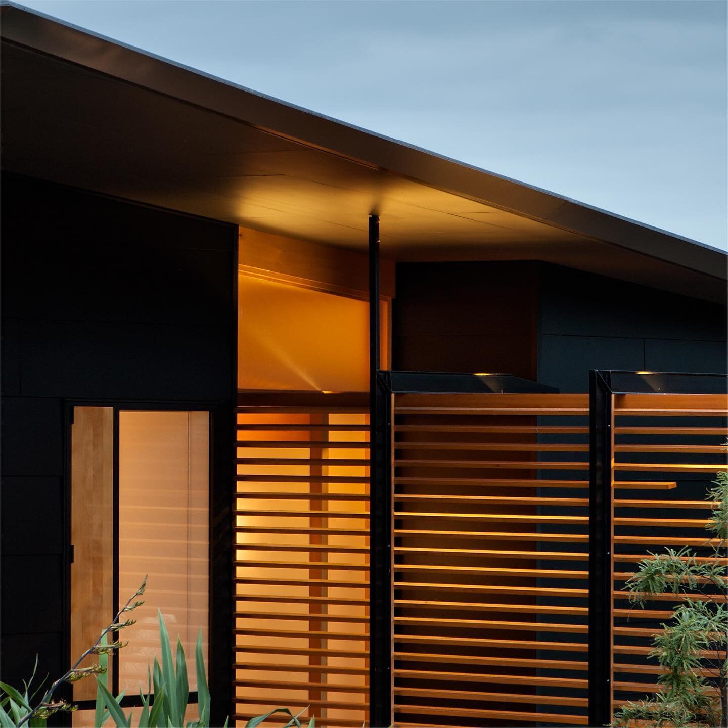 Te Hihi Home &mdash; Warm &amp; inviting entranceway showcasing a yellow cedar louvre screen and front door.