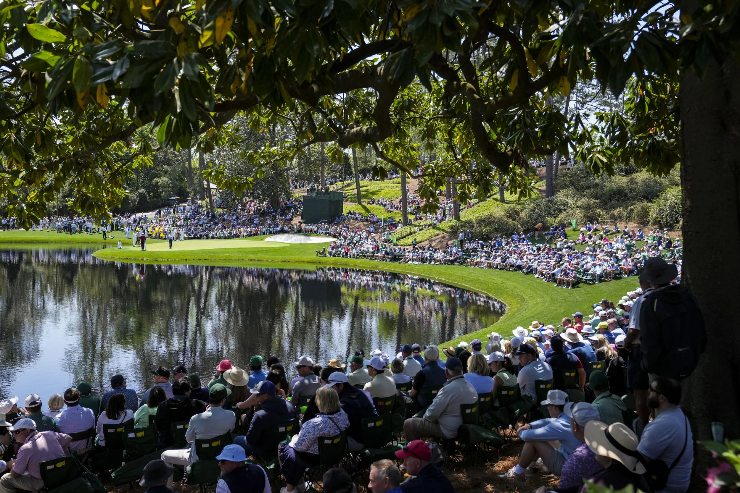 Patrons watch on the ninth green during the Par 3 Contest at Augusta National Golf Club in Augusta, Ga., on Wednesday, April 9, 2025. Mandatory Credit: Grace Smith-Imagn Images
