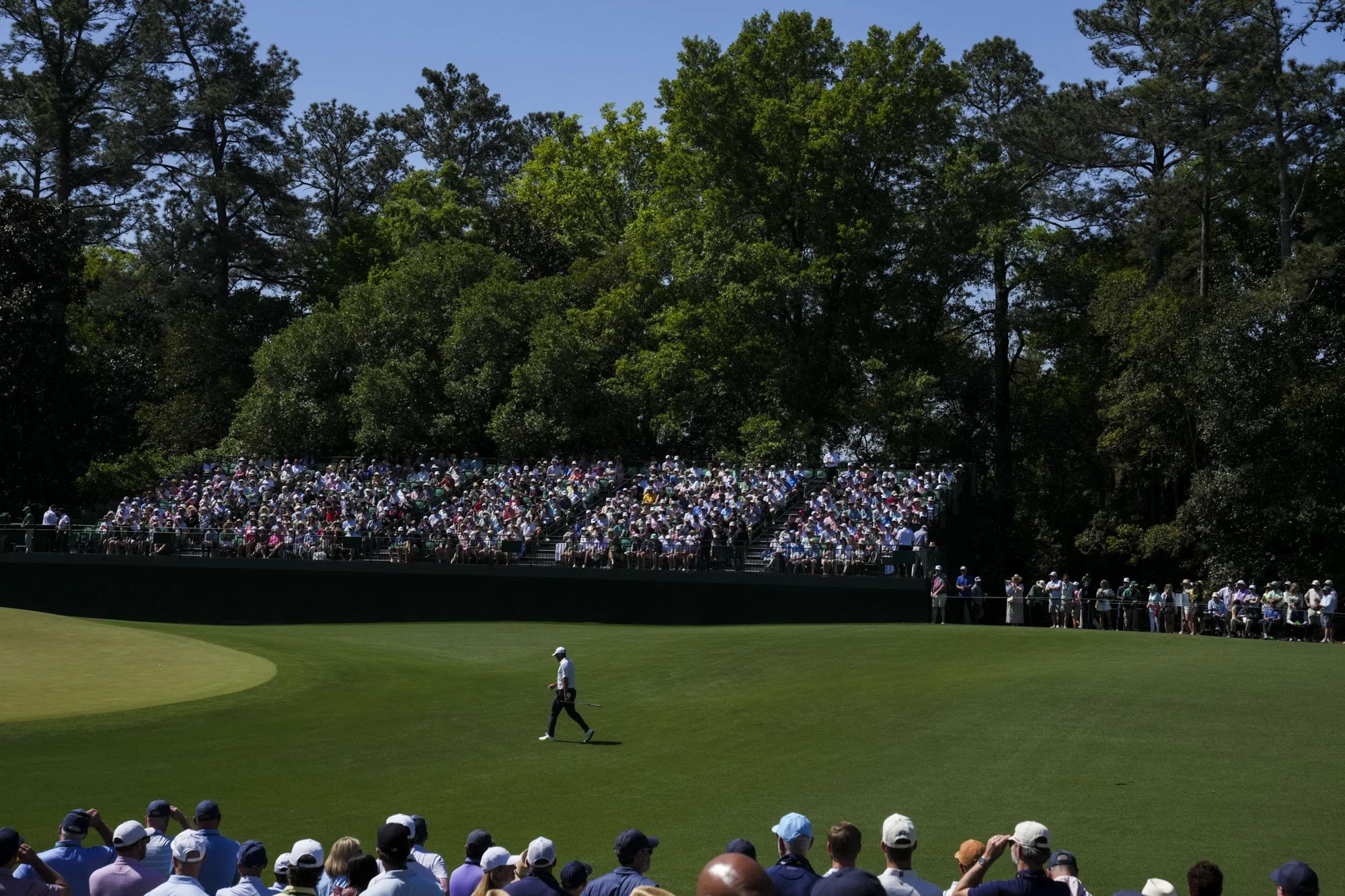 Scottie Scheffler walks up to the fifth green Friday, April 10, 2026, during the second round of the Masters Tournament at Augusta National Golf Club. Mandatory Credit: Grace Smith-Imagn Images