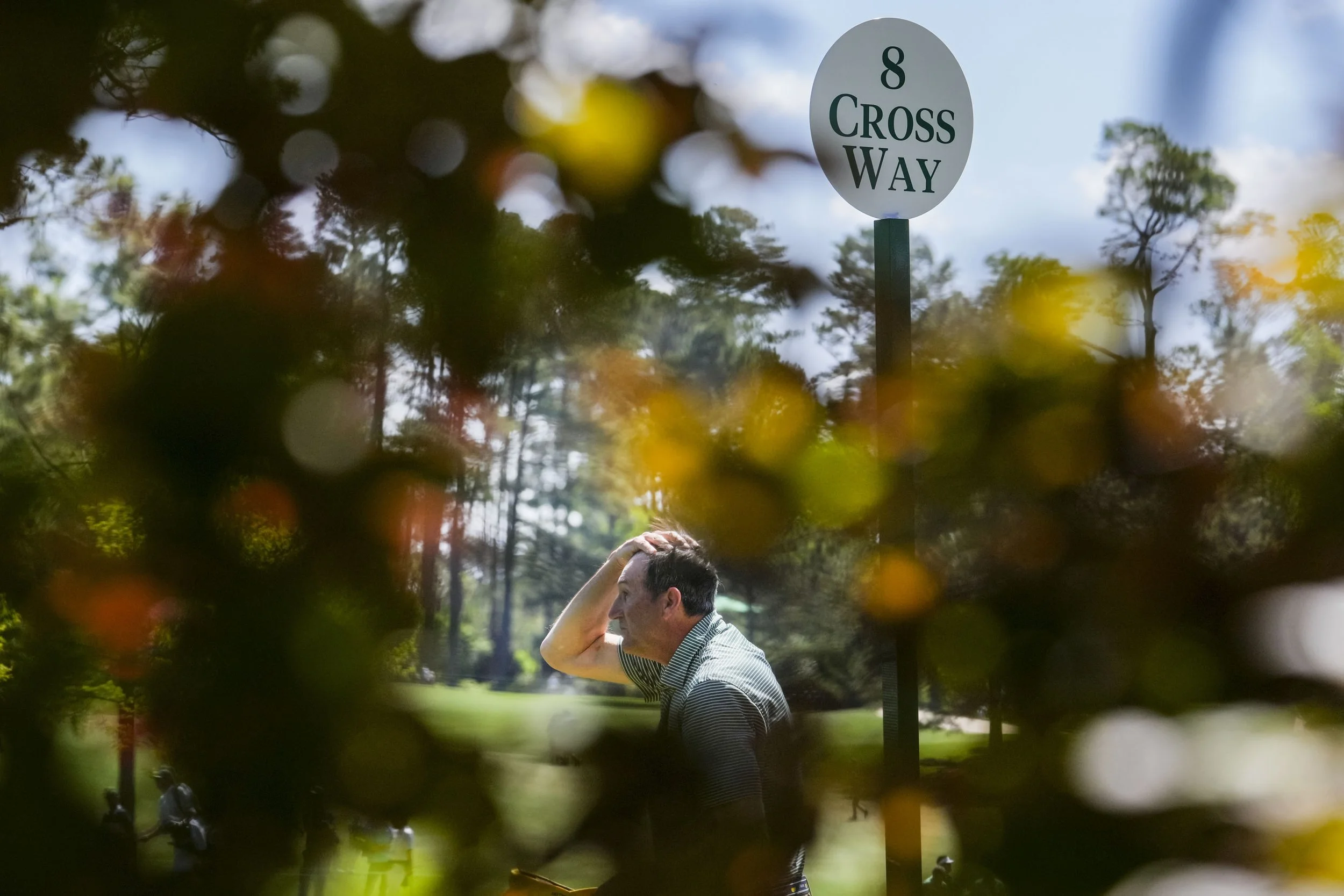 A gallery guard wipes his head near the no. 8 crossway during the second round of the Masters Tournament at Augusta National Golf Club in Augusta, Ga., on Friday, April 11, 2025. Mandatory Credit: Grace Smith-Imagn Images