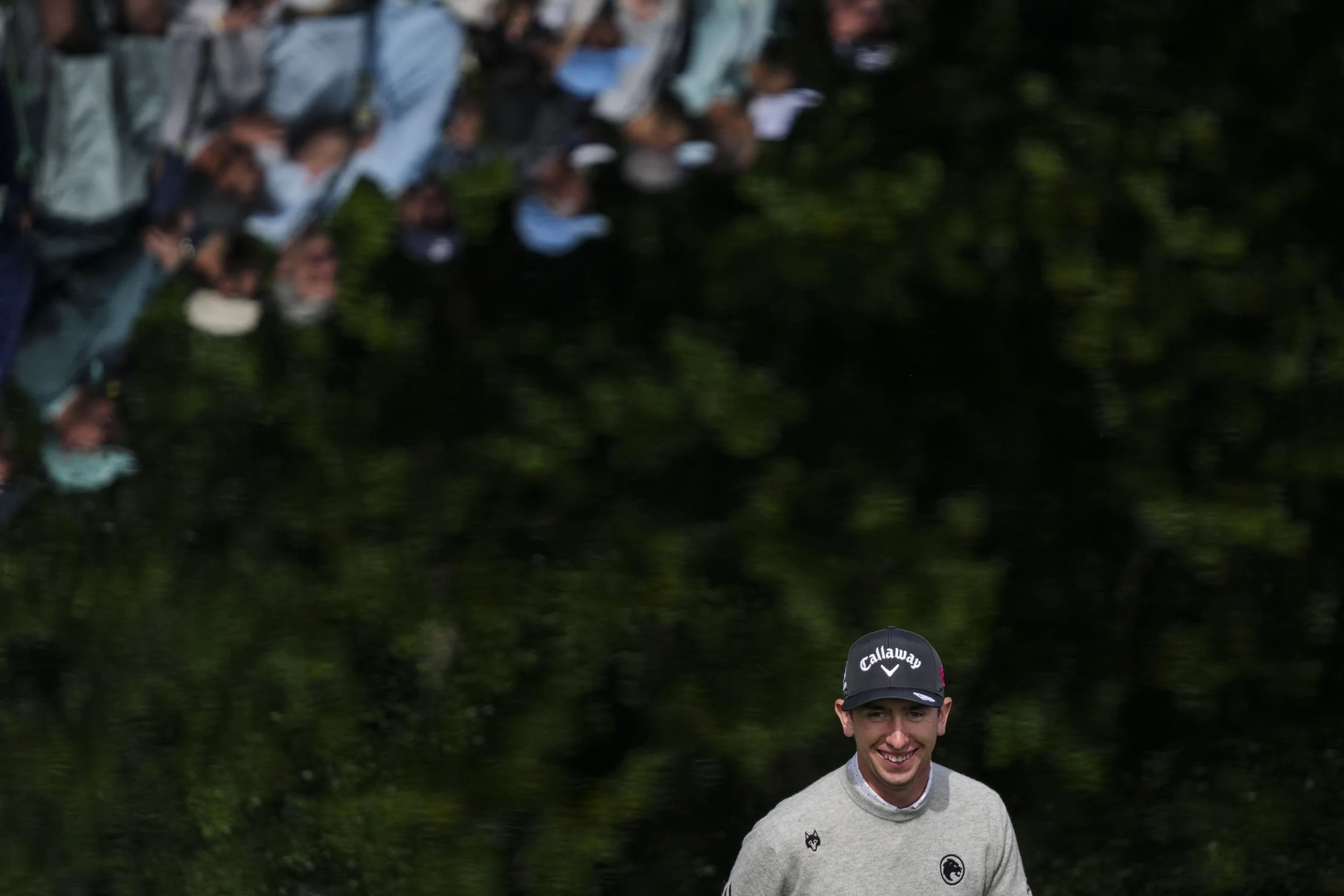 Tom McKibbin smiles after skipping the ball across the water on the 16th hole Tuesday, April 7, 2026, during a practice round for the Masters Tournament at Augusta National Golf Club. Mandatory Credit: Grace Smith-Imagn Images