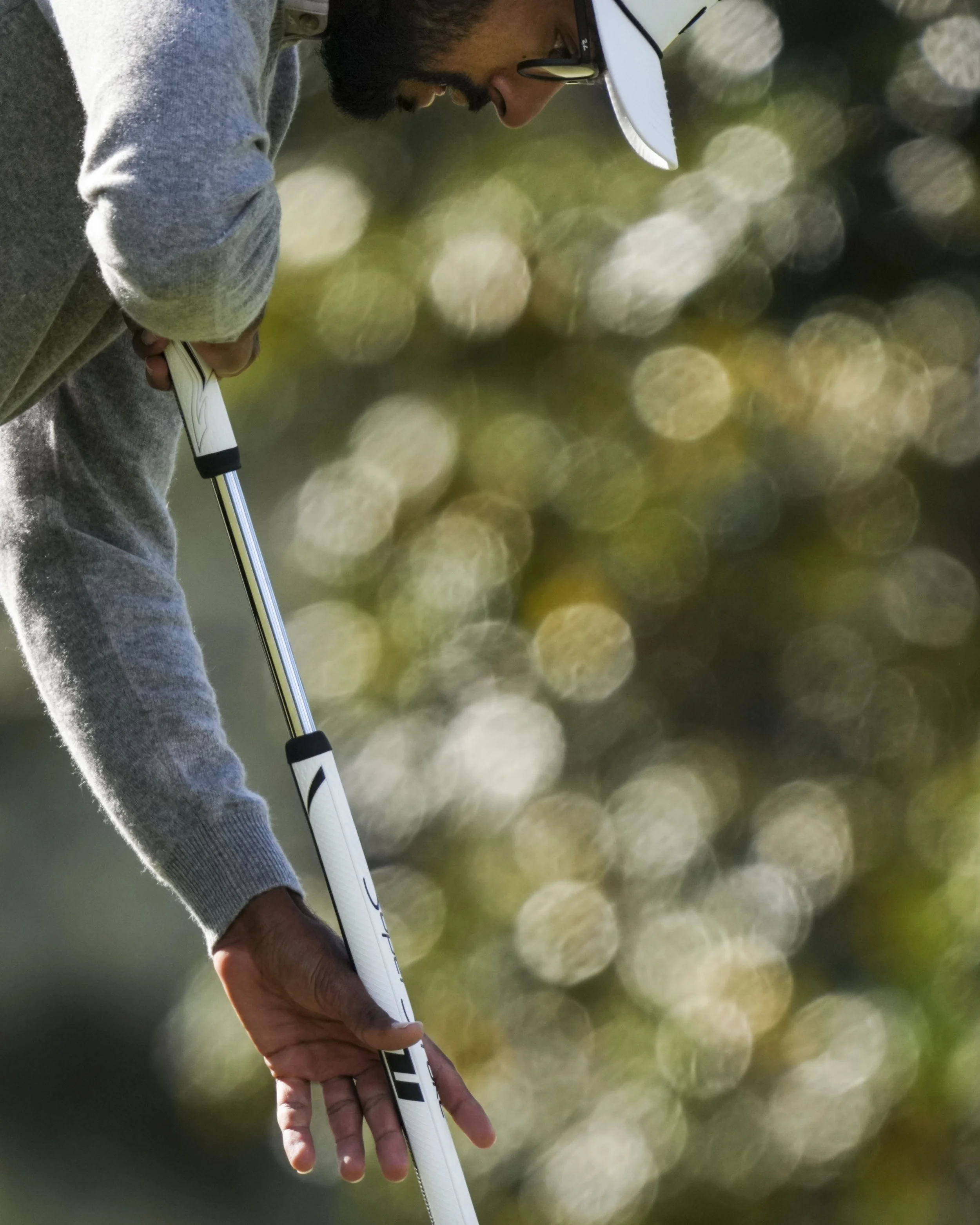 Akshay Bhatia putts on the no. 1 green Thursday, April 9, 2026, during the first round of the Masters Tournament at Augusta National Golf Club. Mandatory Credit: Grace Smith-Imagn Images