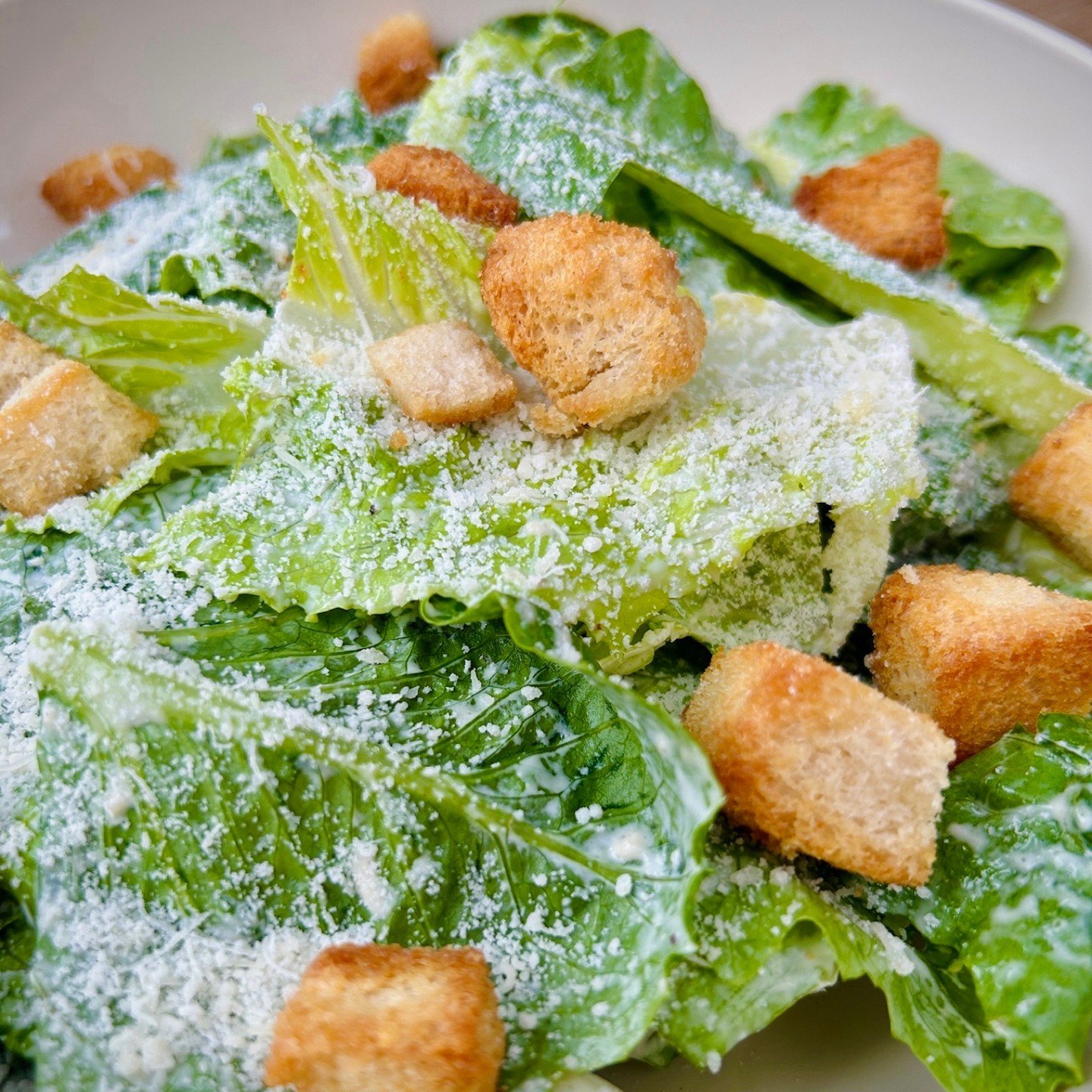 Ever heard the story behind the Caesar Salad? Legend has it that back in the 1920&rsquo;s, Caesar Cardini whipped it up when he ran out his ingredients in his restaurant in Tijuana. Talk about improv! Come by our spot and enjoy our take on this inven