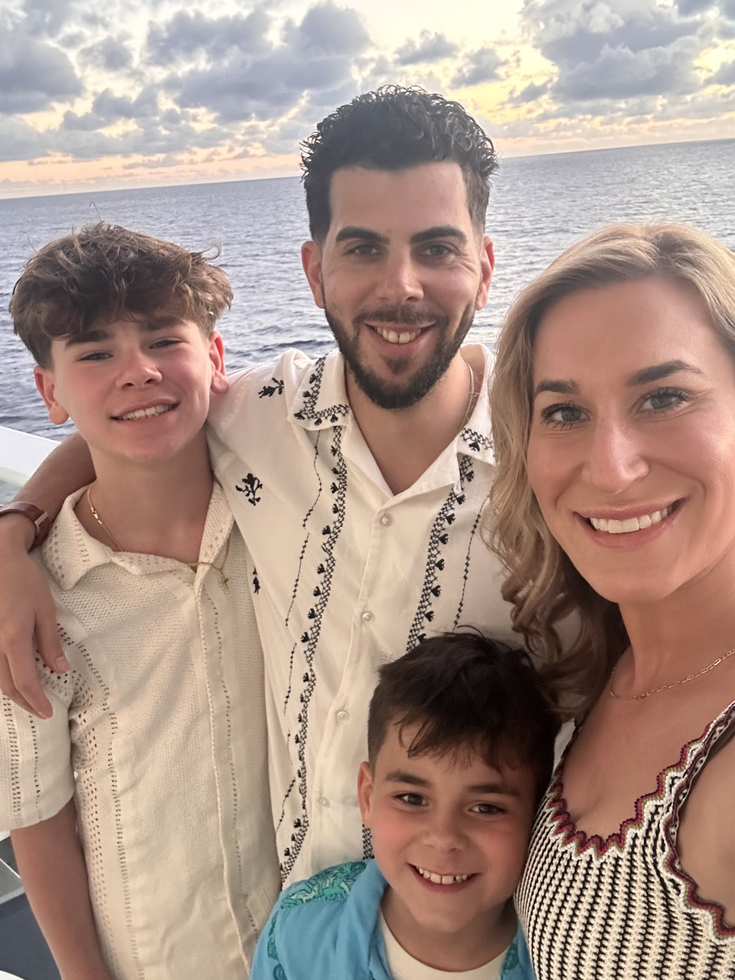 Courtney Woods Manager at Jolie Aesthetics & Wellness with her kids and husband