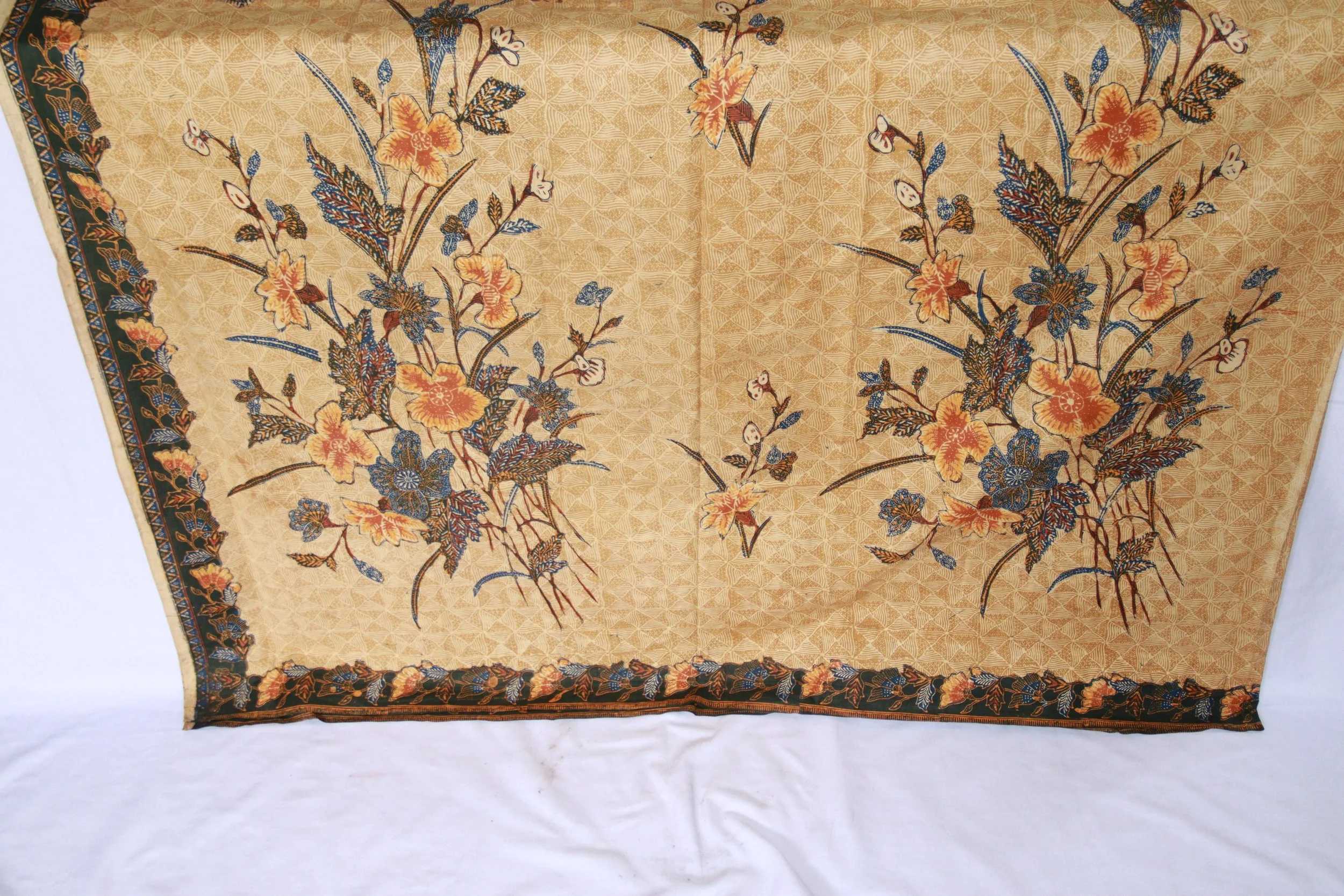 archive number: r-2-012
object reference: 
Lasem Batik
origin: Java
date: 1900s
notes: Although this specific piece was created in the 19th century, similar batik cloth was often used as a barter item by traders from peoples across the Indonesian arc